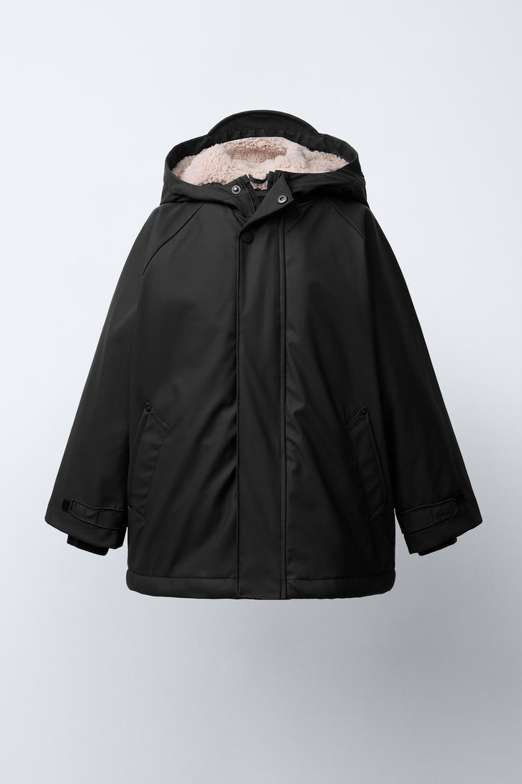 RUBBERISED WATER-RESISTANT RAINCOAT WITH FAUX SHEARLING LINING