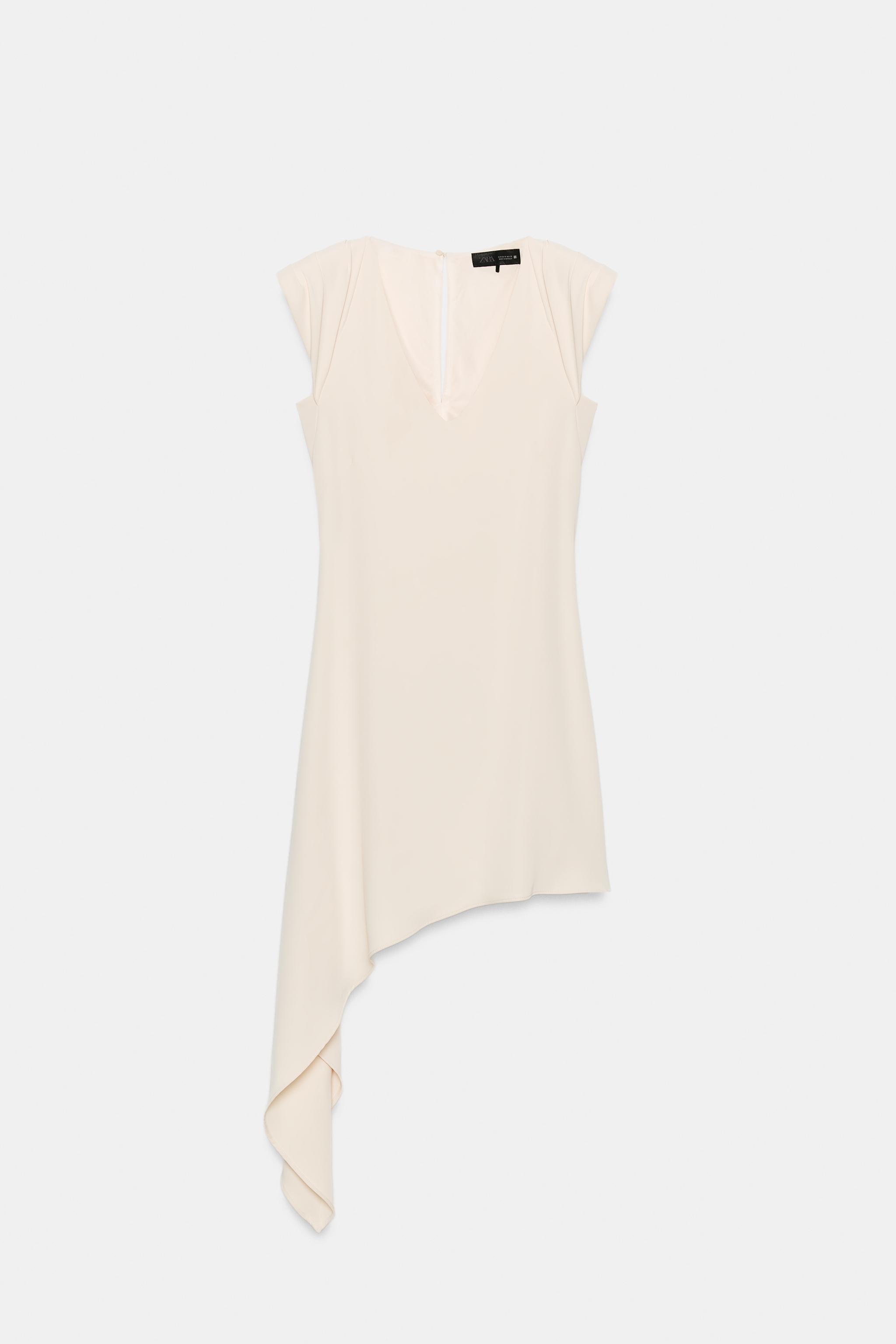 ASYMMETRIC SHORT DRESS WITH SHOULDER PADS