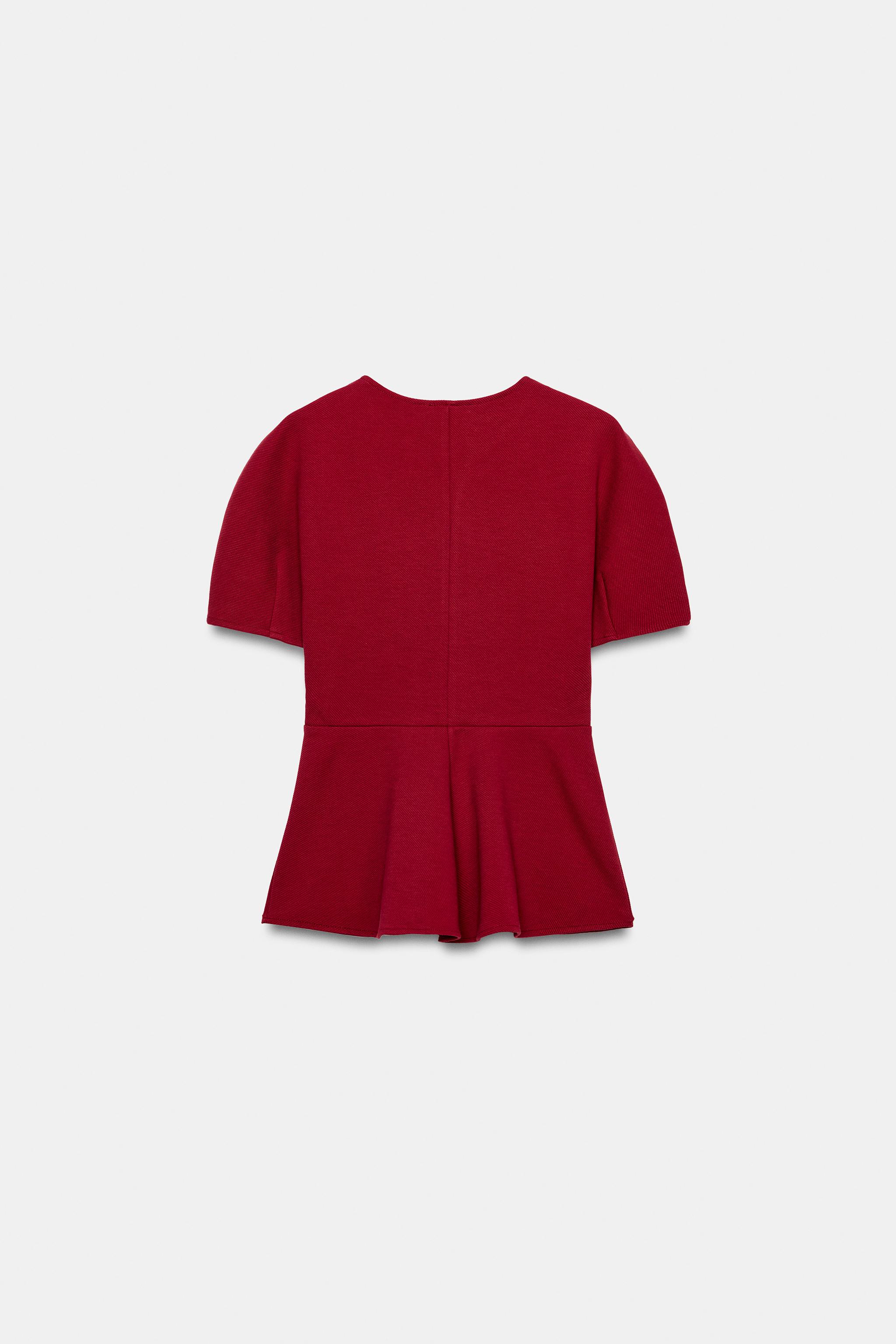 TOP PÉPLUM À MANCHES BOUFFANTES