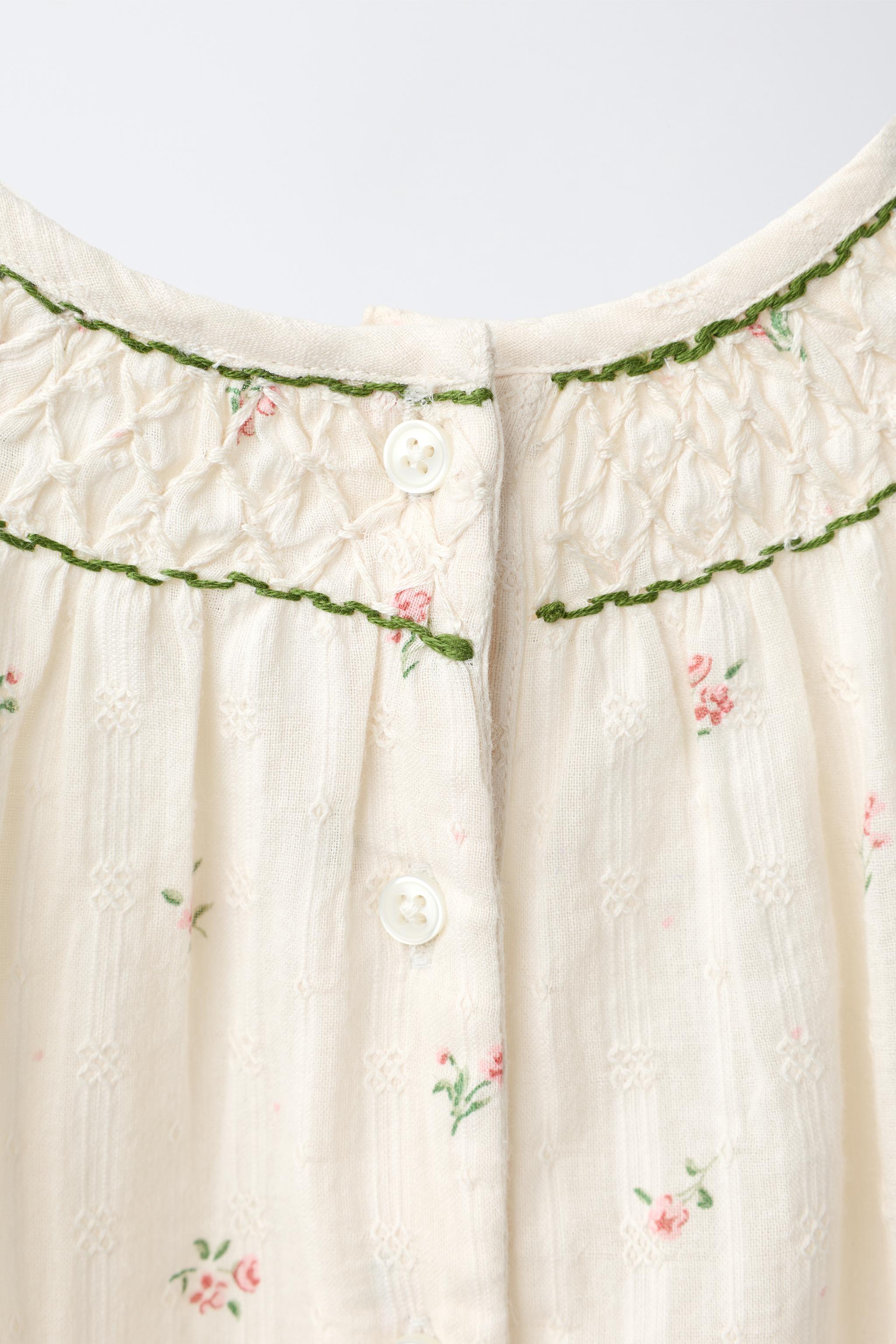 EMBROIDERED FLORAL BODYSUIT