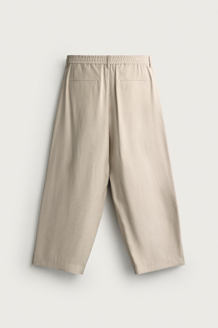 Pantalones con pliegues corte relajado 3
