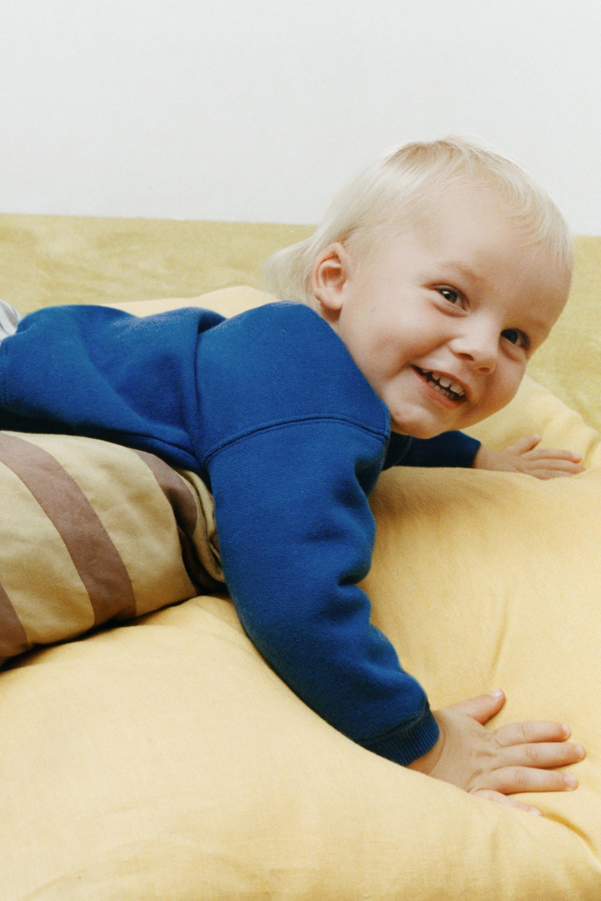 STRIPED BAGGY PANTS WITH LABEL