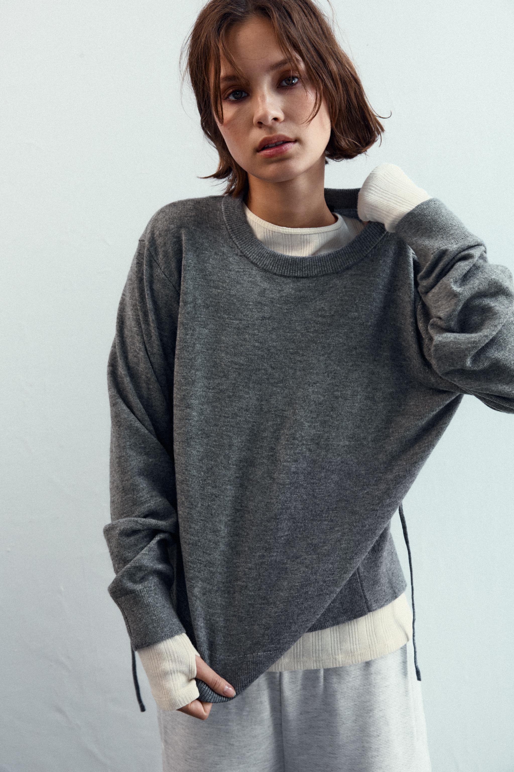 KNIT SWEATER WITH LACE-UP OPEN BACK