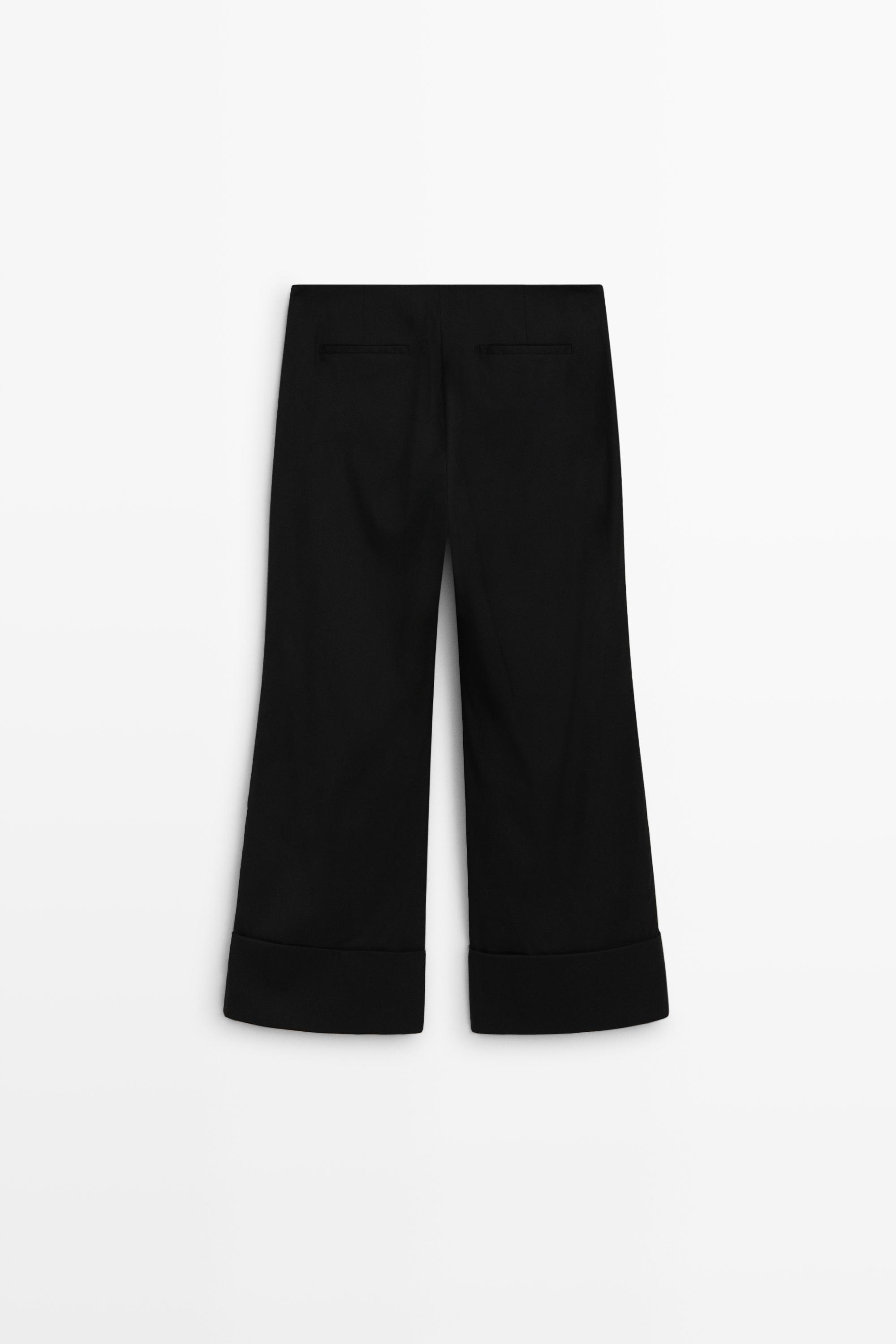 Flare fit pants with hem detail