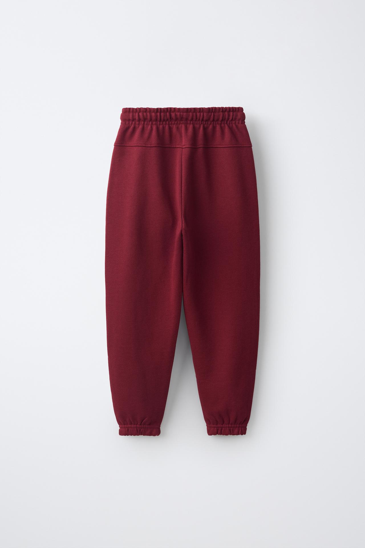 SOLID FLEECE JOGGERS WITH LABEL — Maroon