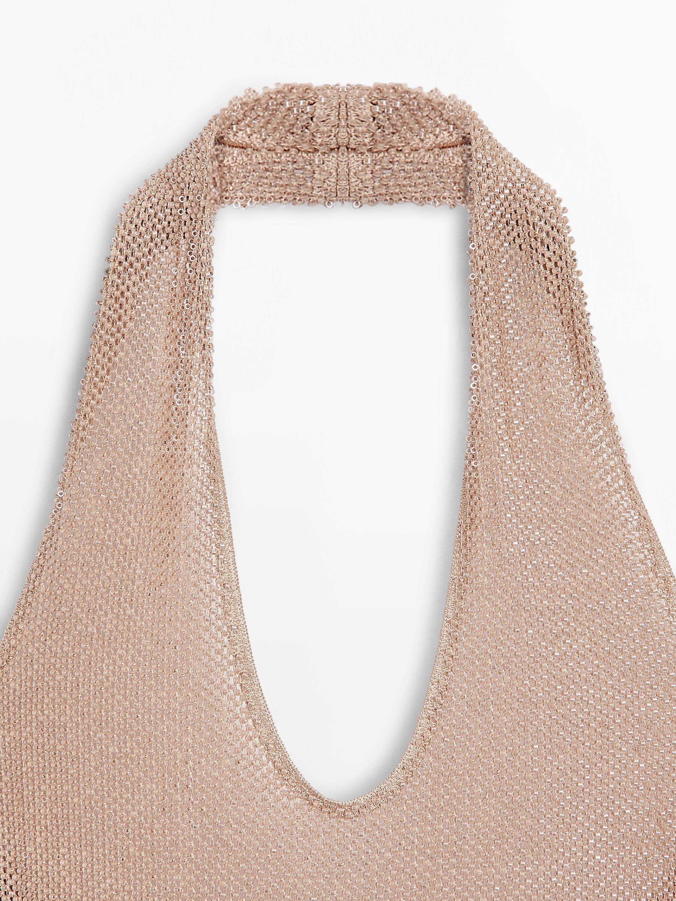 Top en maille brillante à encolure américaine