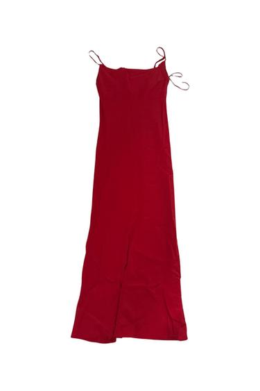 Front view of a long red dress with thin straps.
