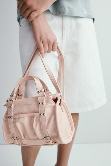 Bolsa cruzada con tachuelas