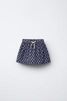 FAUX LEATHER PLEATED SKORT