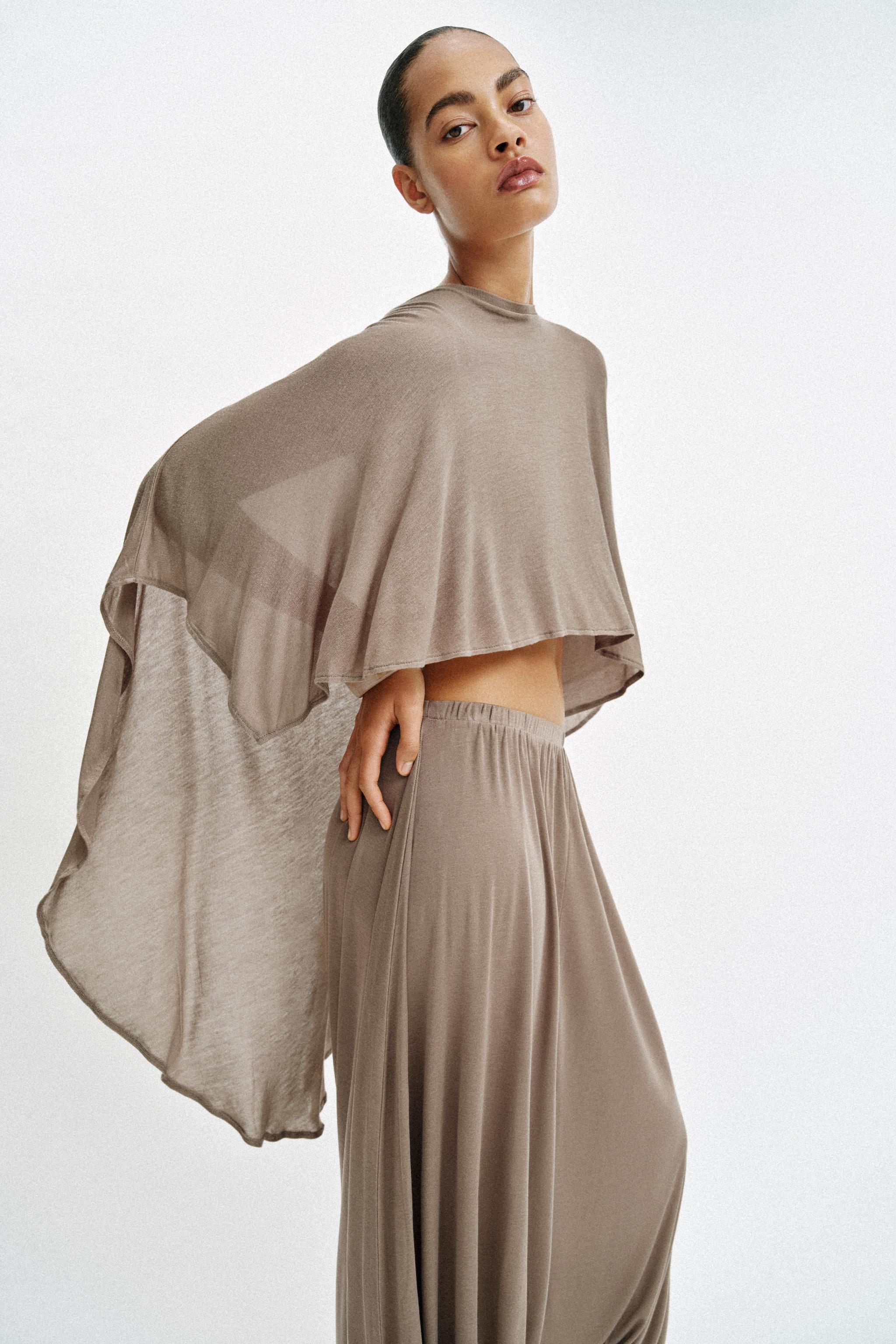 ASYMMETRIC CAPE TOP