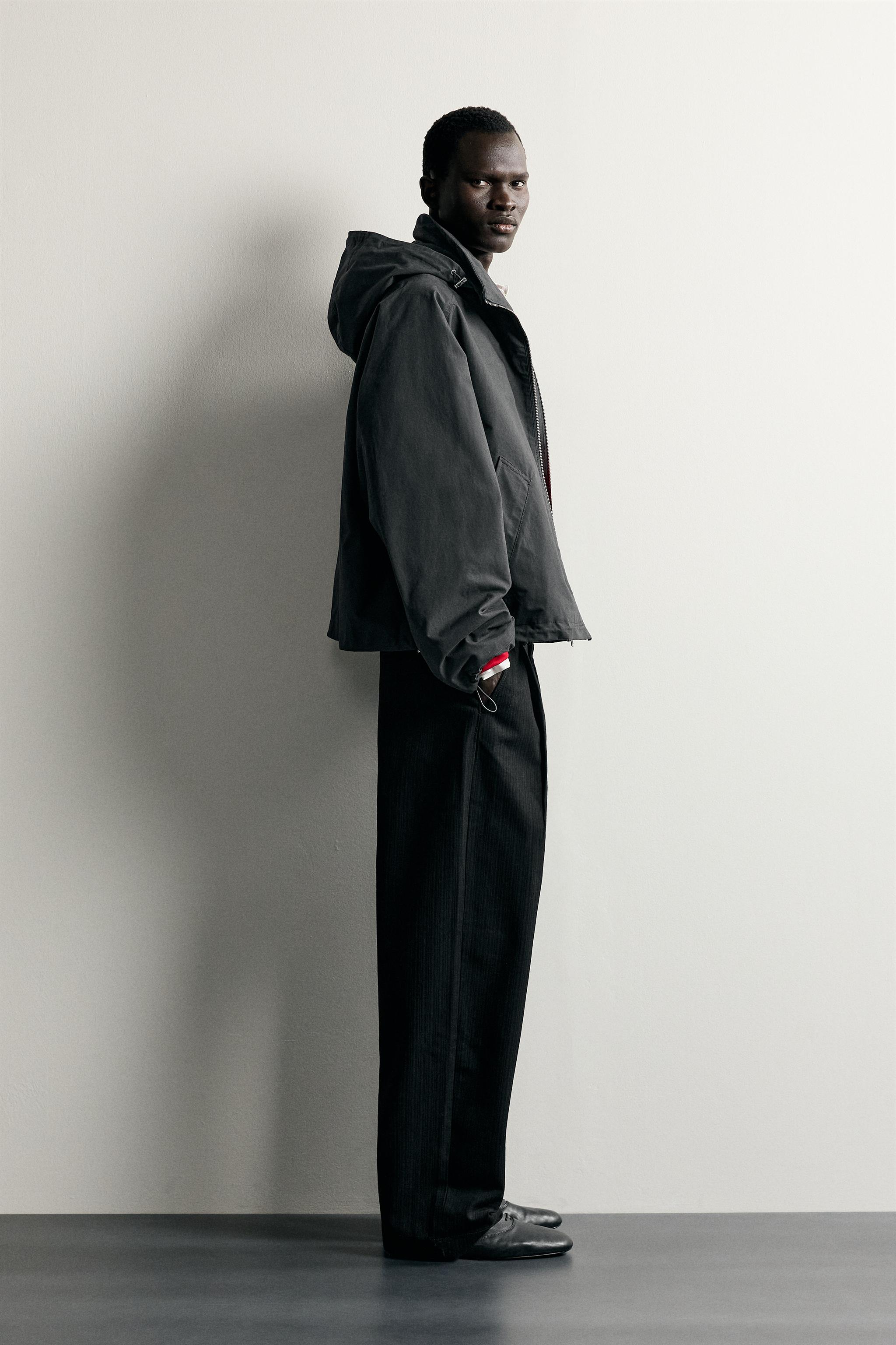 RELAXED FIT PLEATED CHINO PANTS