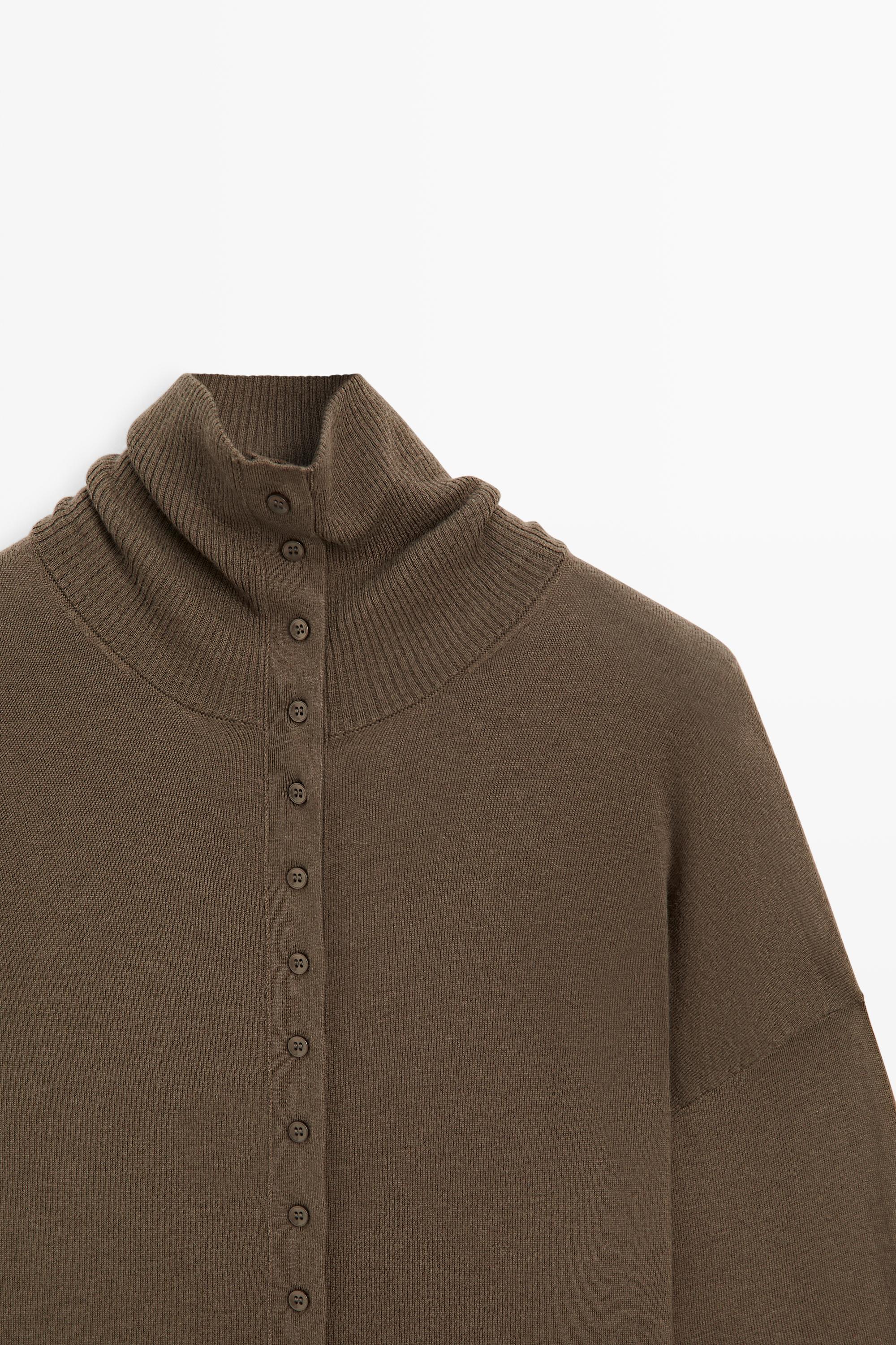 Turtleneck cardigan with button detail