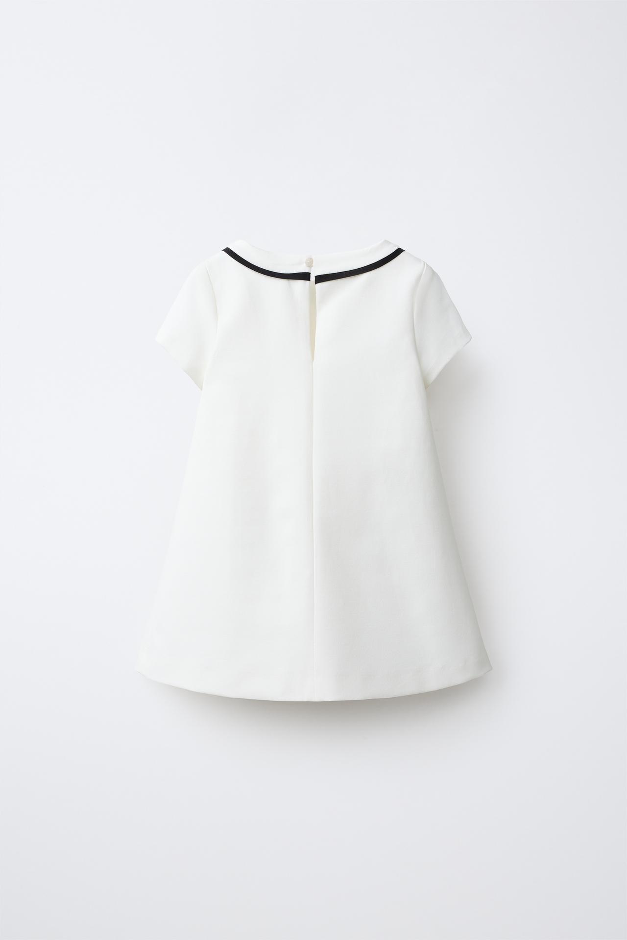 CONTRAST PIPING AND BOW DRESS — Oyster-white