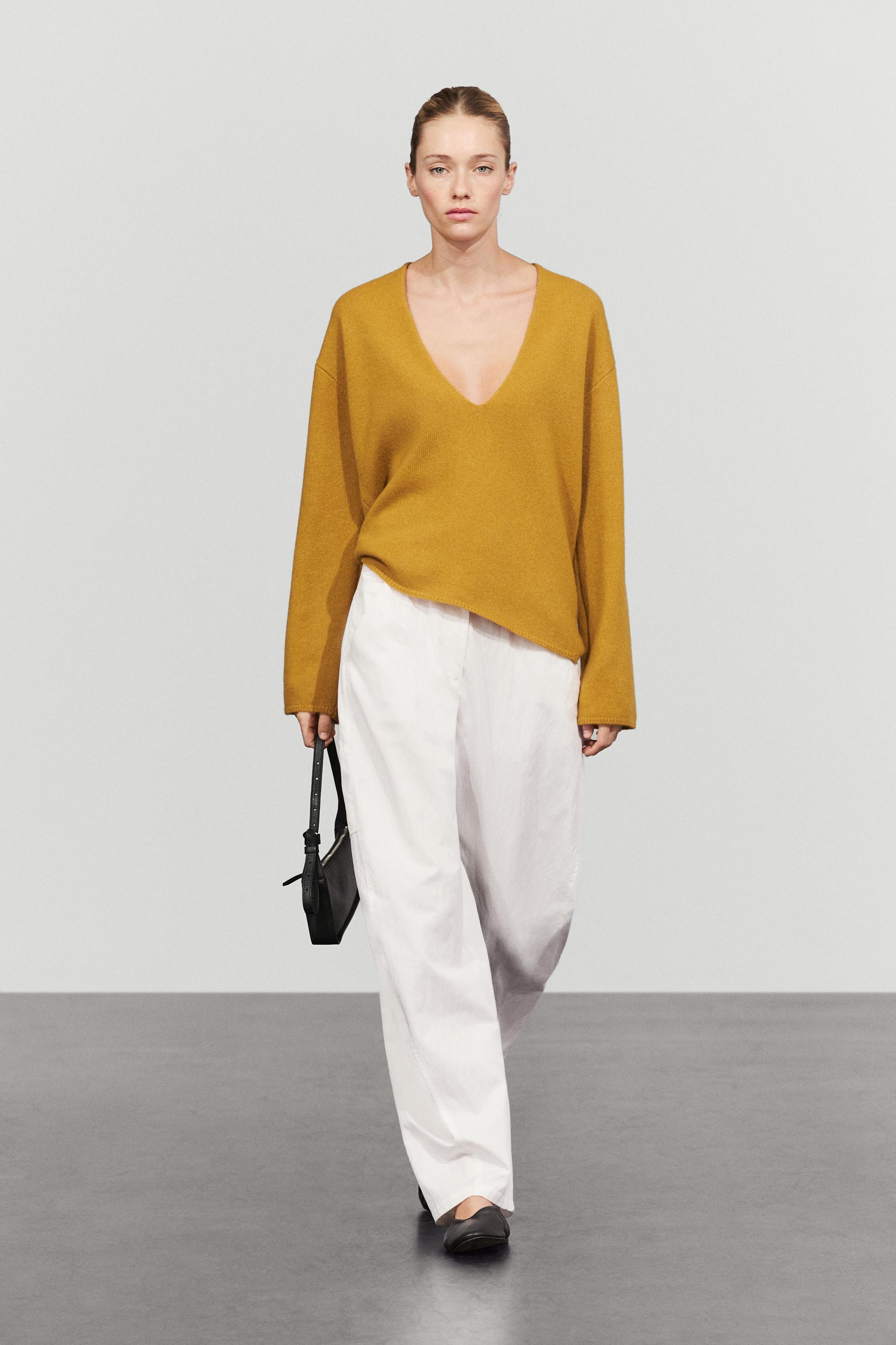 Long-line knit sweater with neckline detail — Mustard