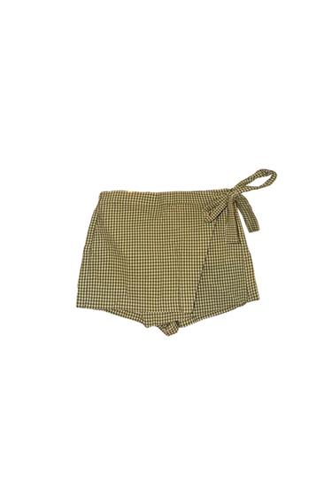 Brown and beige checked shorts with a tie waist, on a white background.