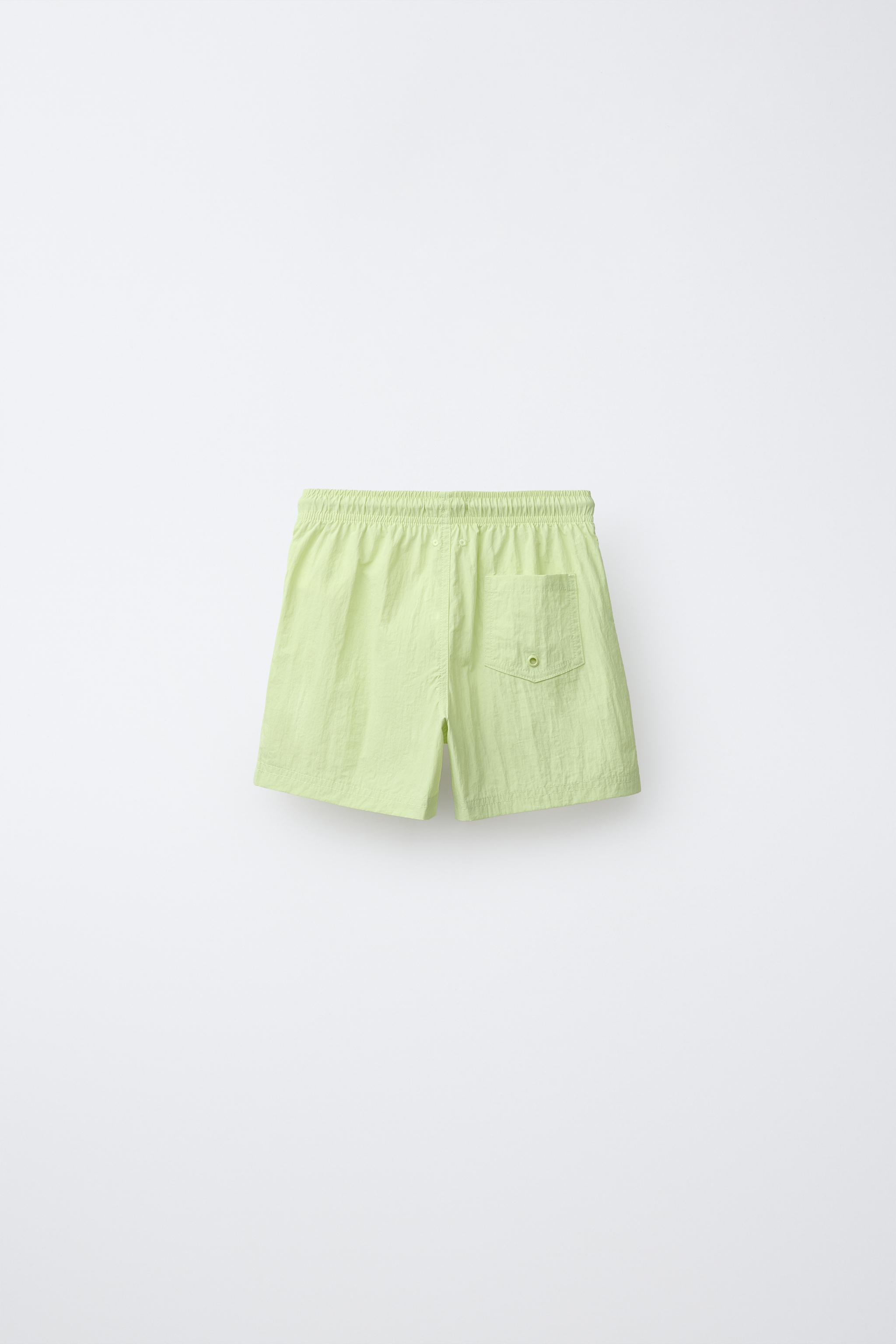AGES 6-14 / PLAIN SWIM SHORTS