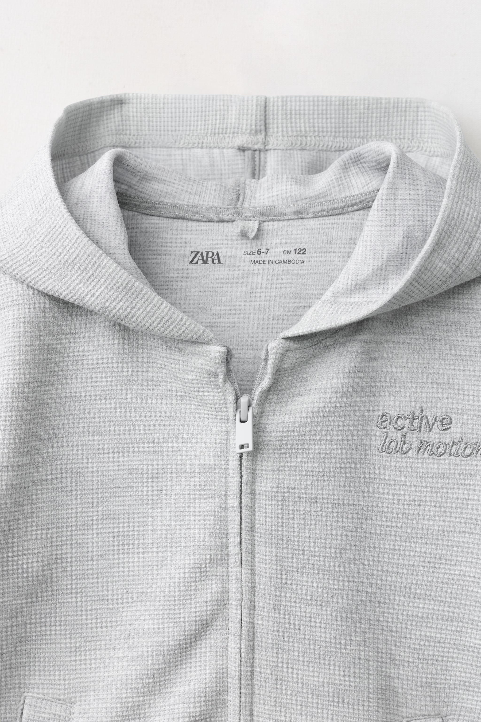 VESTE DE GYM AVEC CAPUCHE WAFFLE