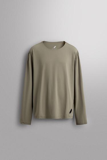 T-SHIRT TECHNIQUE RUNNING À MANCHES LONGUES ET IMPRIMÉ GRAPHIQUE - Gris clair de Zara