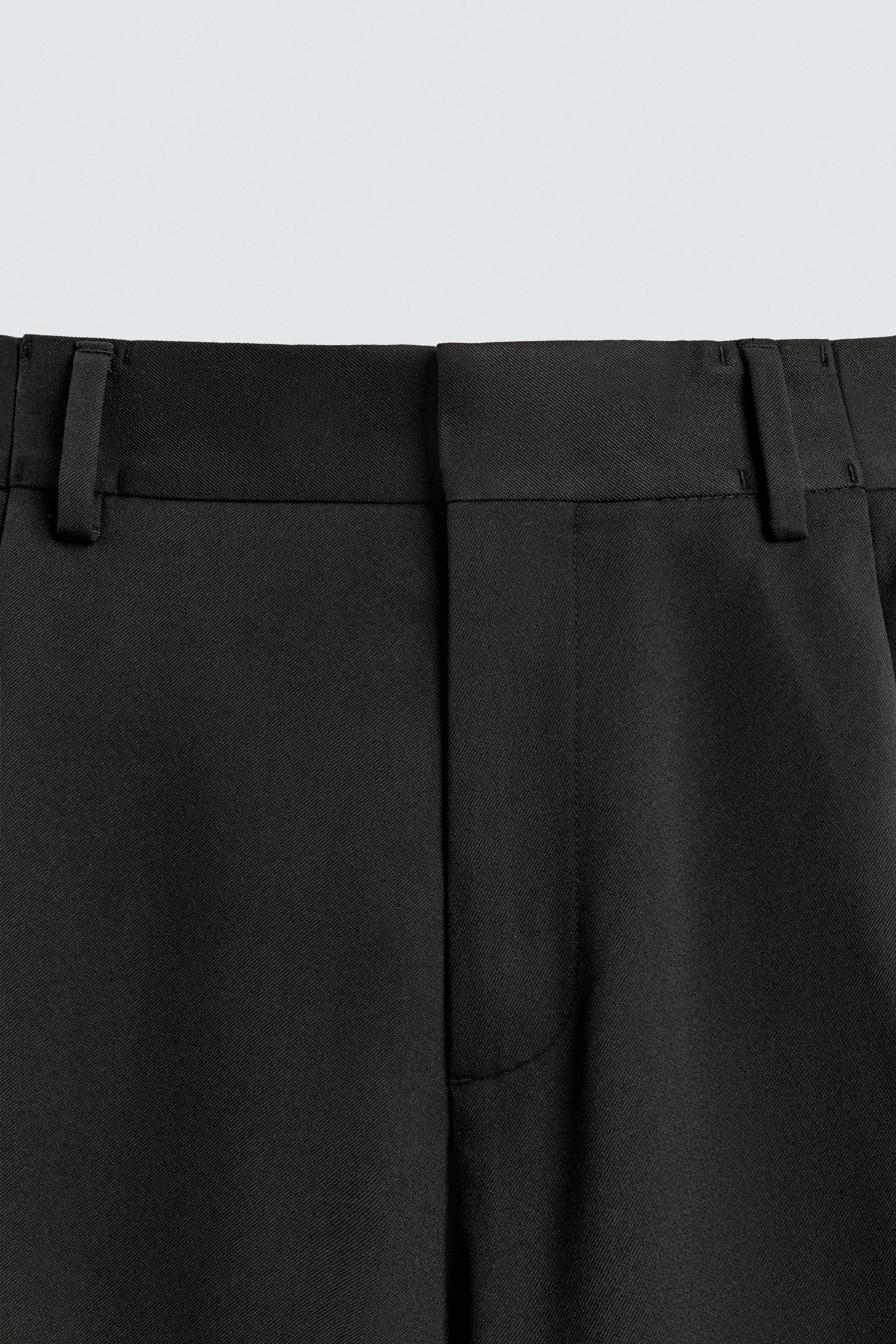 PLEATED WIDE FIT PANTS