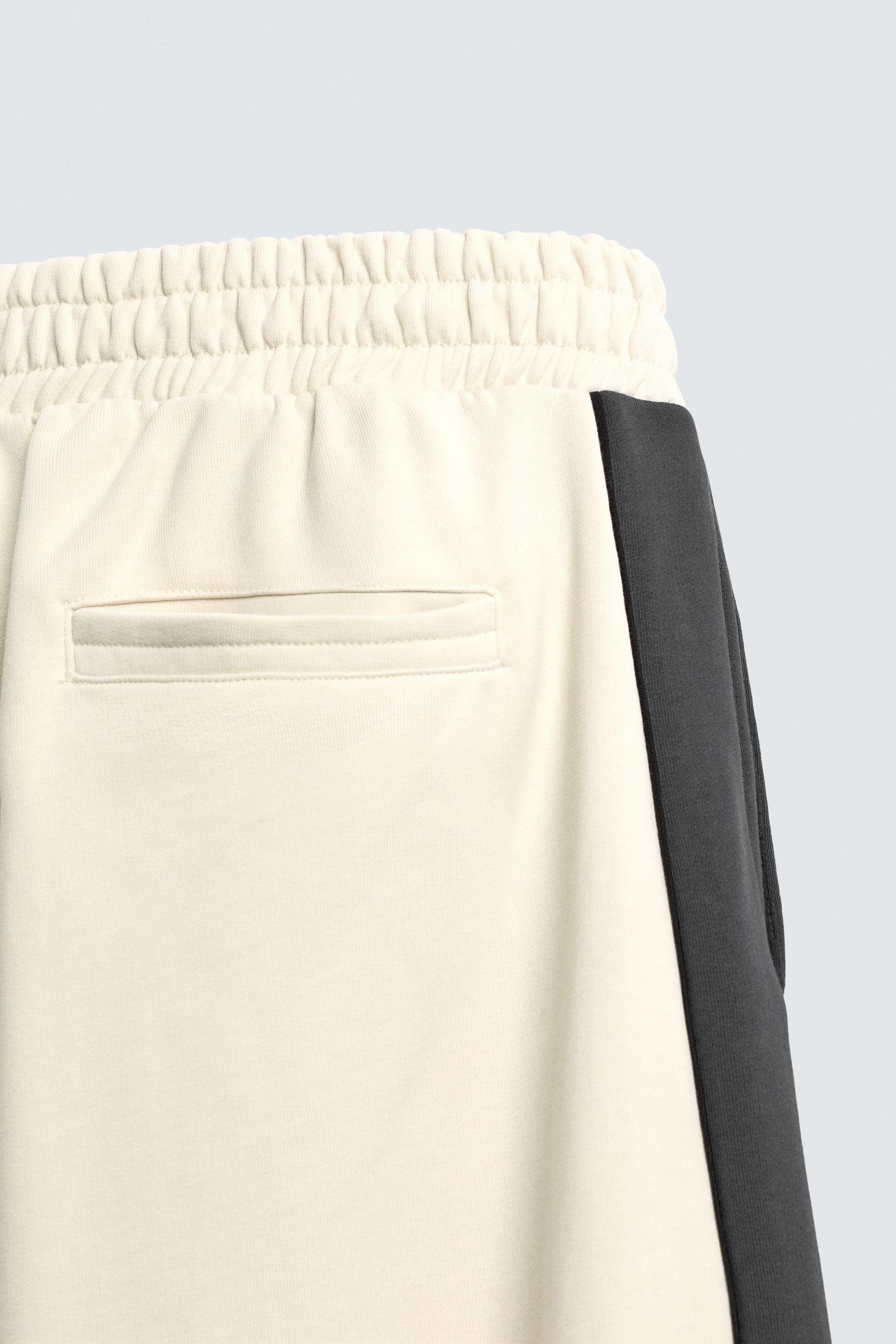 WIDE FIT JOGGER PANTS WITH STRIPES