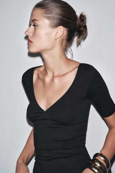 Zaras T-SHIRT AV BOMULL OCH MODAL - Svart