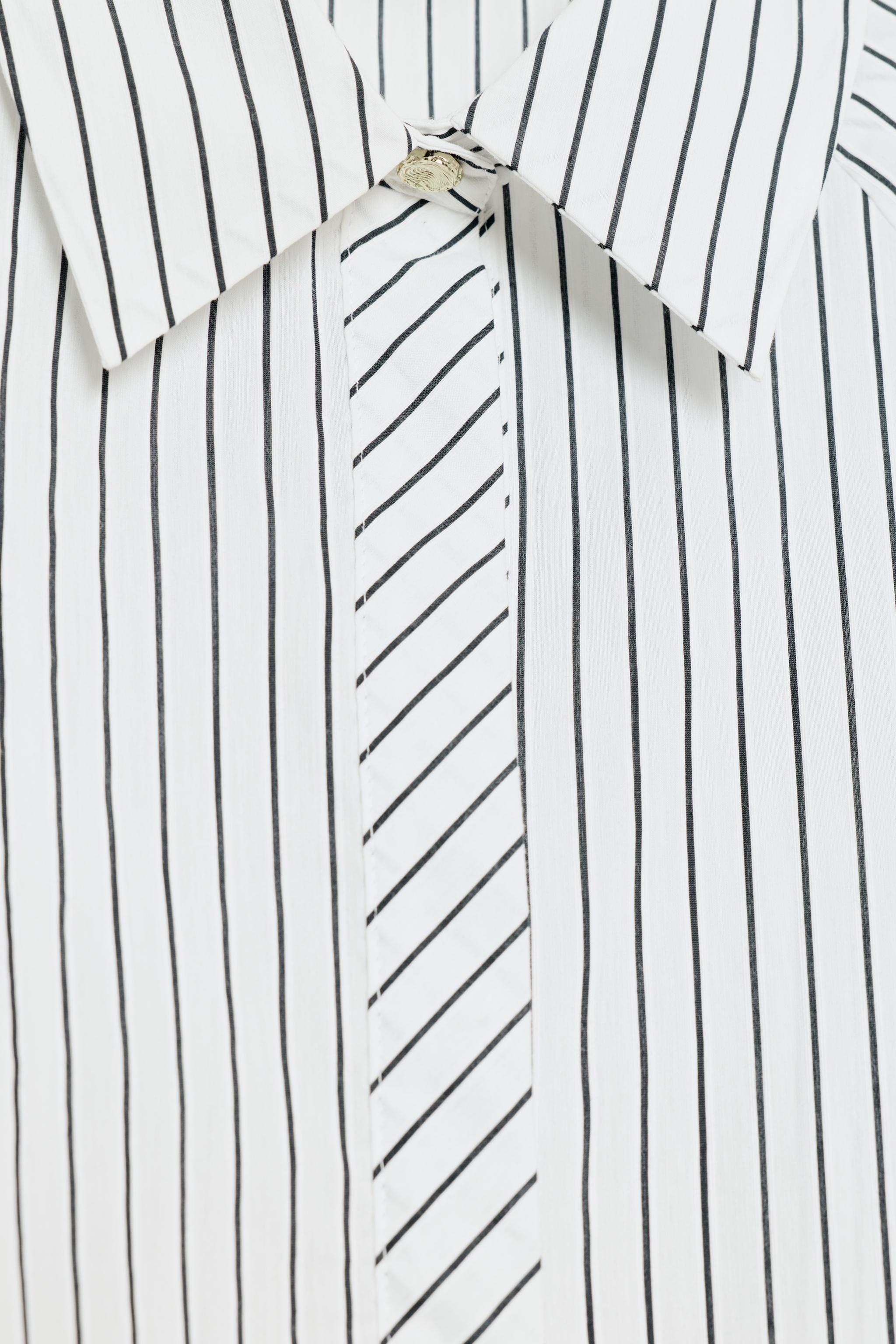 CHEMISE À RAYURES ET MANCHES BOUFFANTES