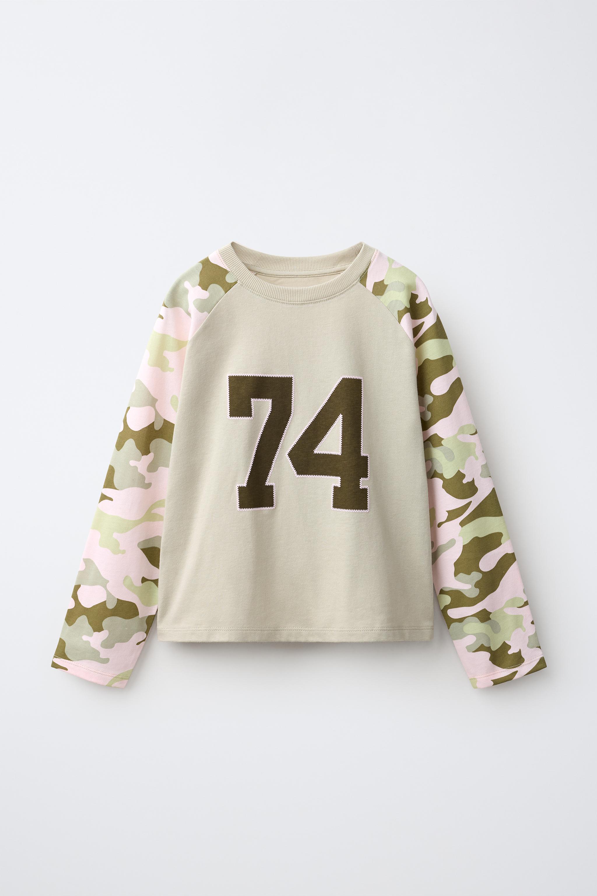 CAMISETA MANGA RANGLAN ESTAMPADA