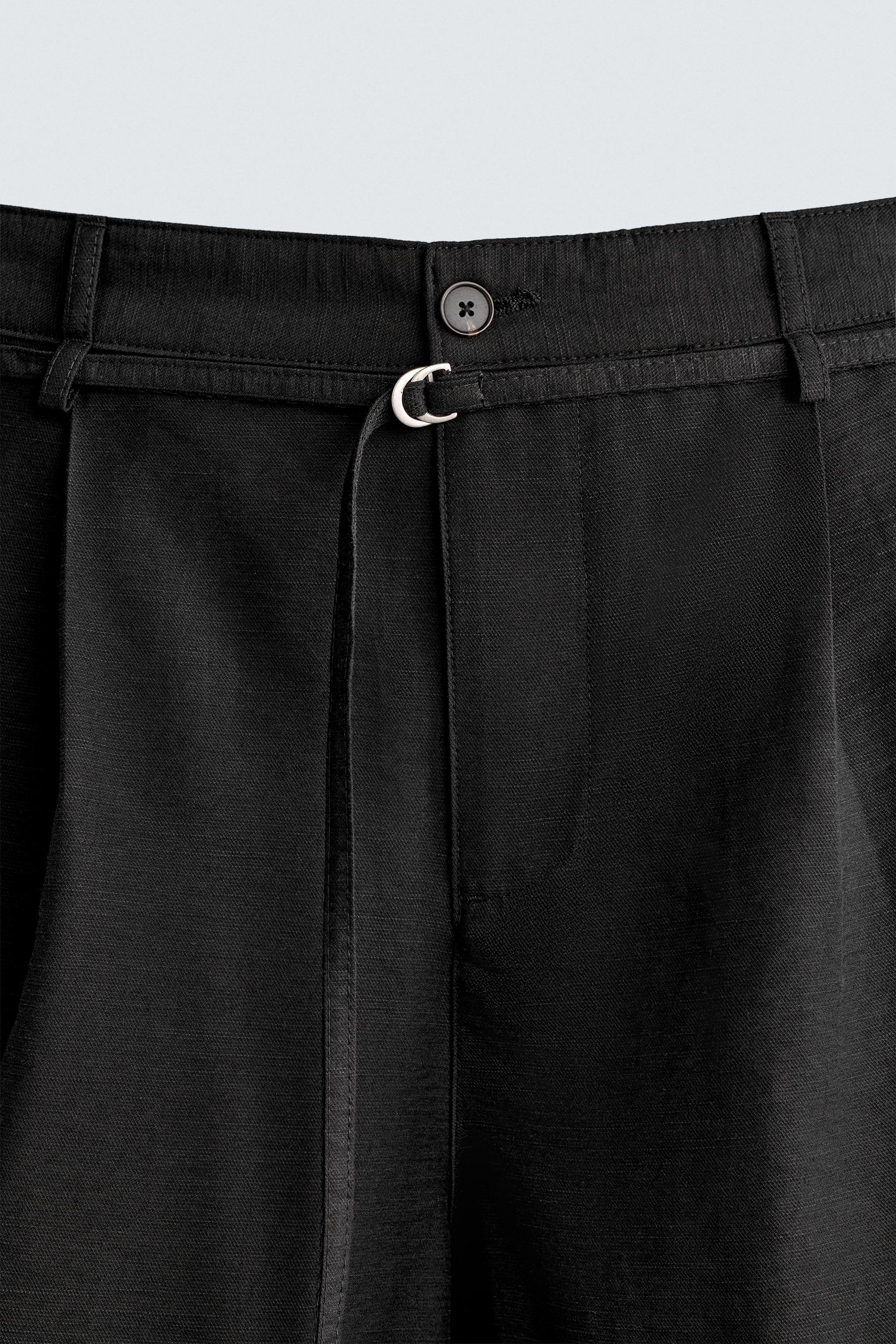 RELAXED FIT BELTED PLEATED SHORTS