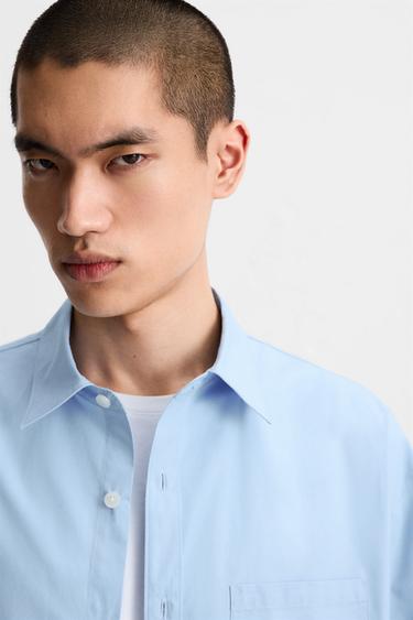 CHEMISE EN POPELINE AVEC POCHE - Bleu ciel de Zara - Image 6
