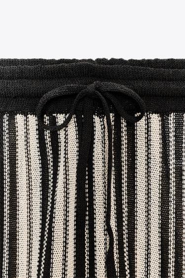 PANTALON RAYÉ À POIGNETS AVEC LIN - Écru / Noir de Zara - Image 7