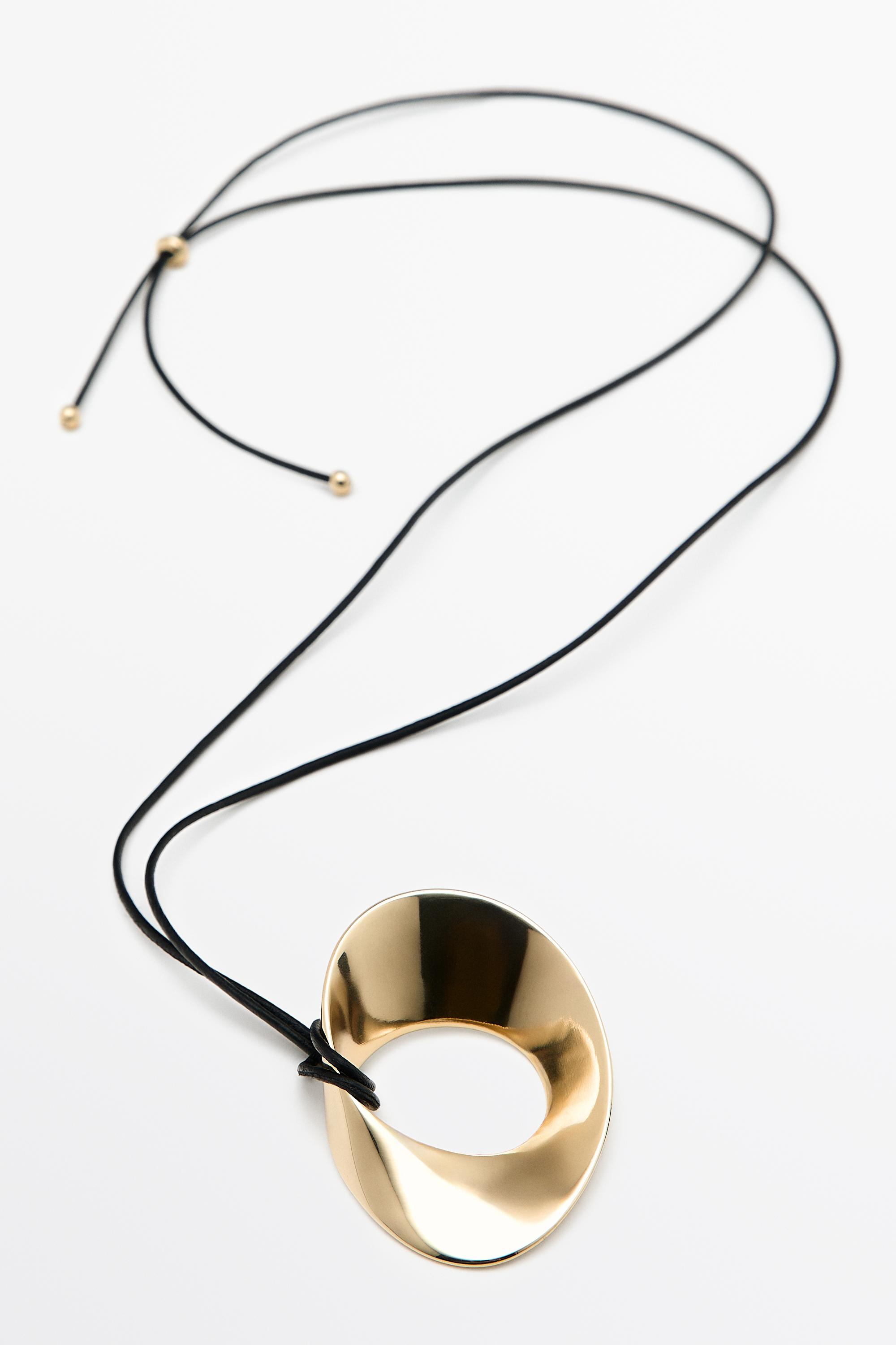 Twist hoop necklace — Golden