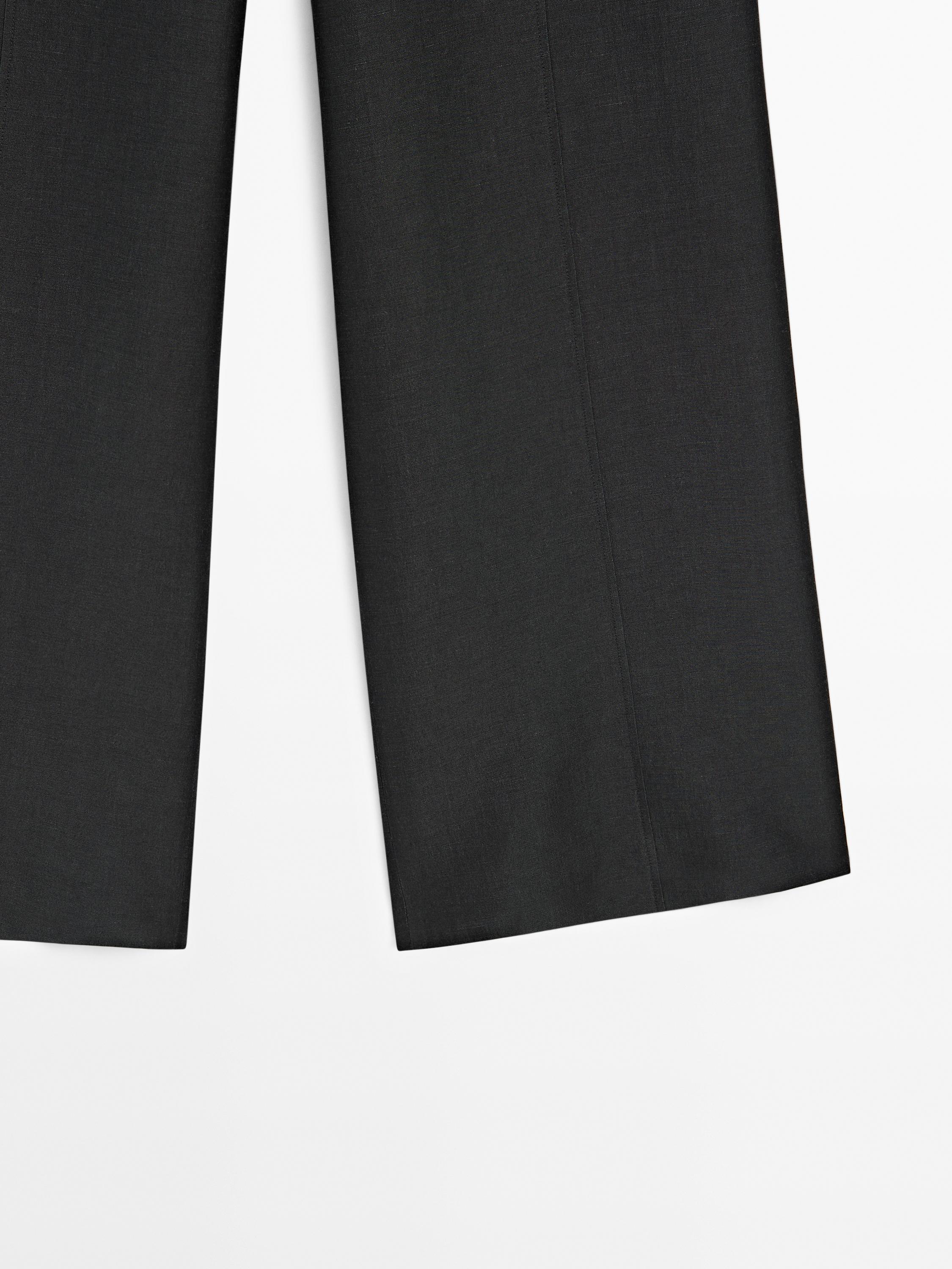 Pantalon large et fluide coutures apparentes