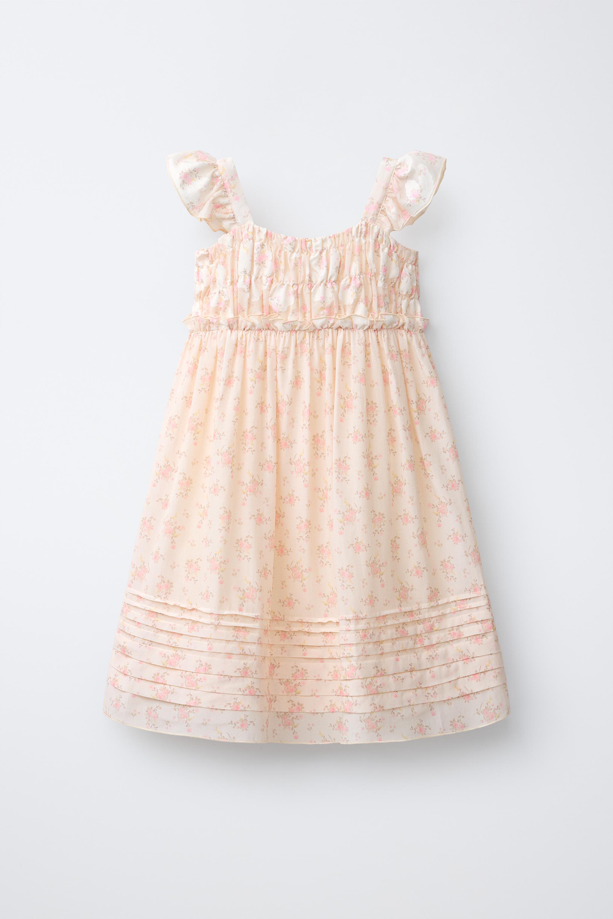ROBE EN MATIÈRES VARIÉES À FLEURS