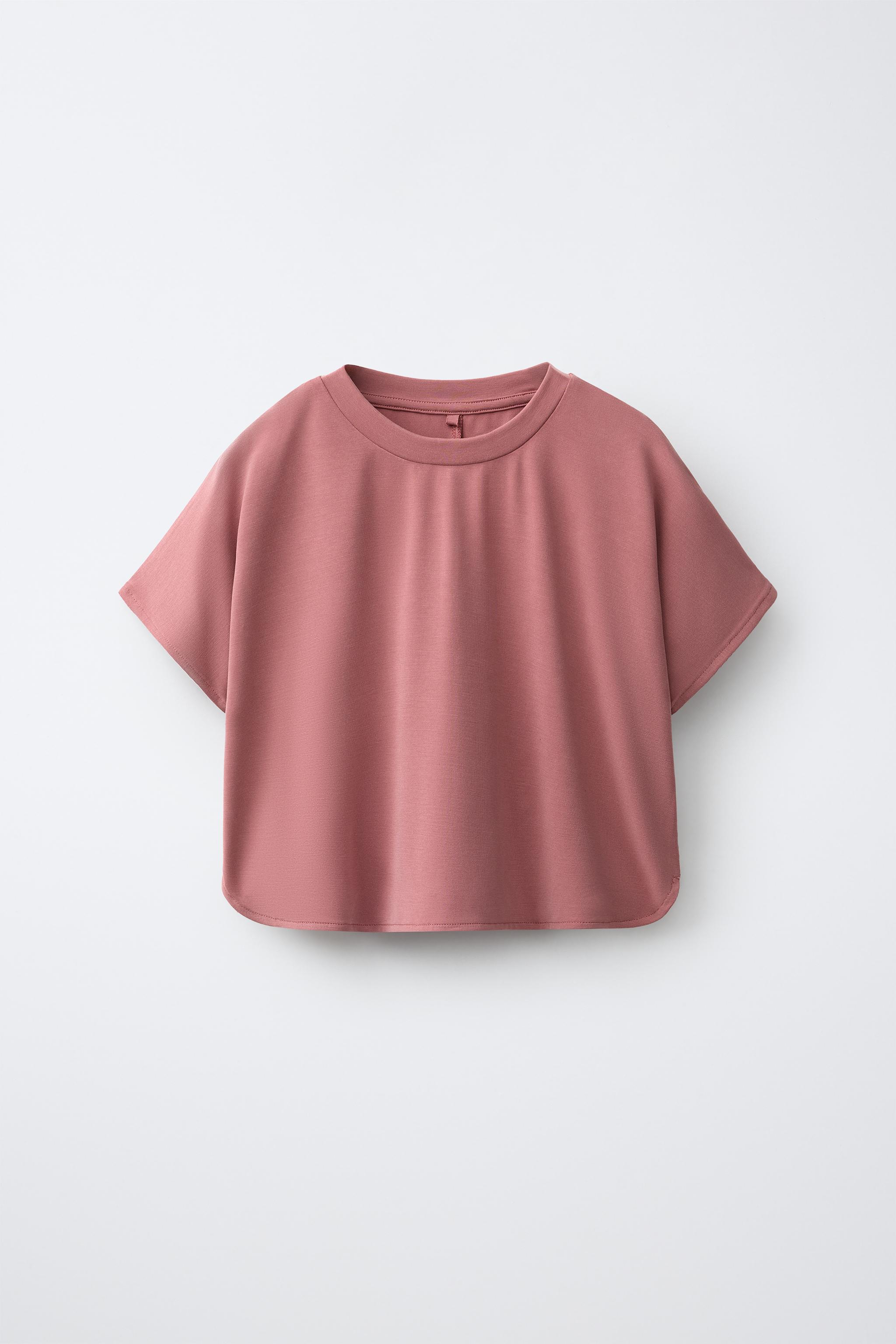 CAMISETA FLUIDA SPORTY CON MODAL