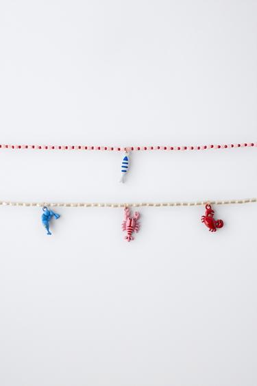 PACK OF TWO NECKLACES WITH PEARLS AND SEA BEADS - White by Zara