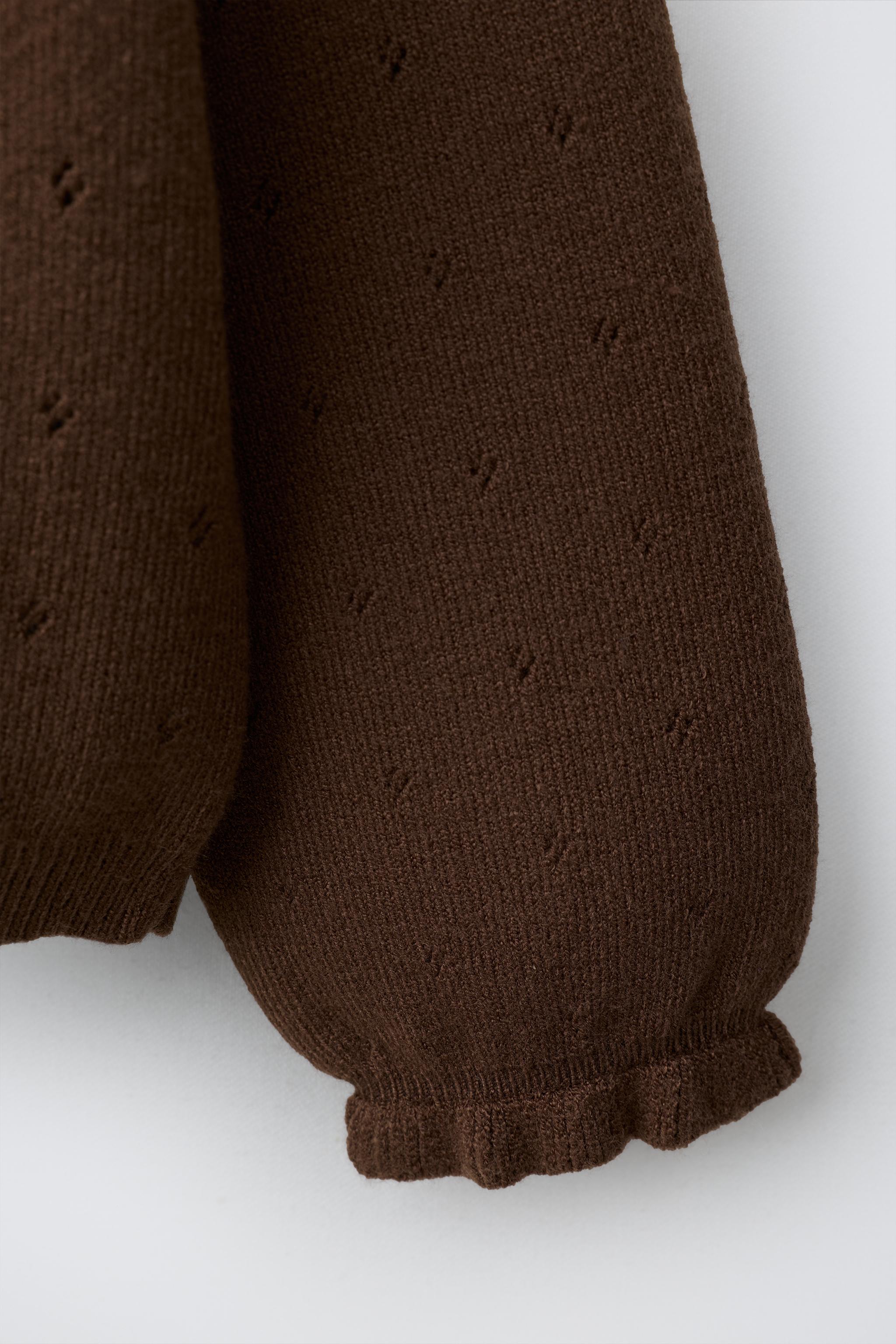 EMBROIDERED KNIT SWEATER
