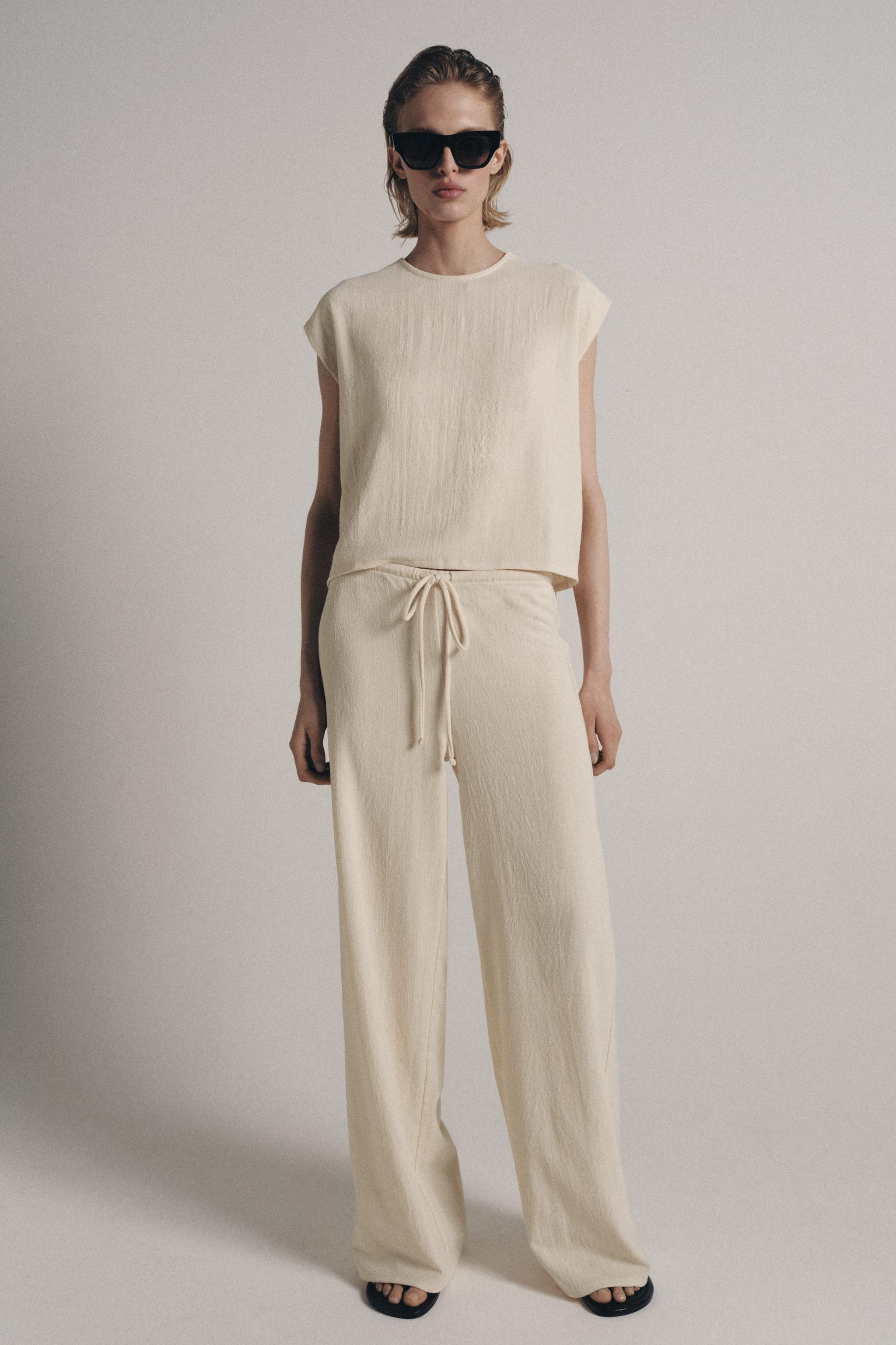 RUSTIC SLEEVELESS TOP