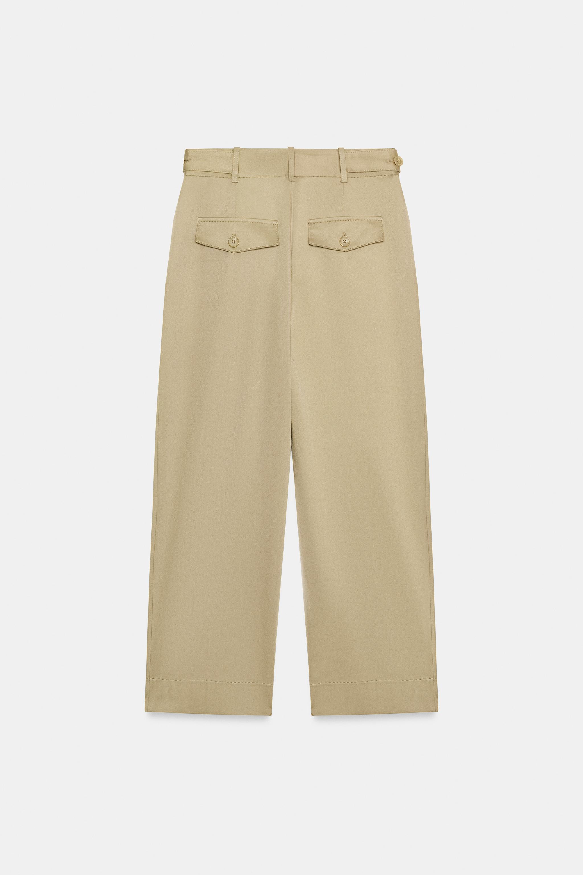 PANTALON TAILLE BASSE À PASSANTS LATÉRAUX