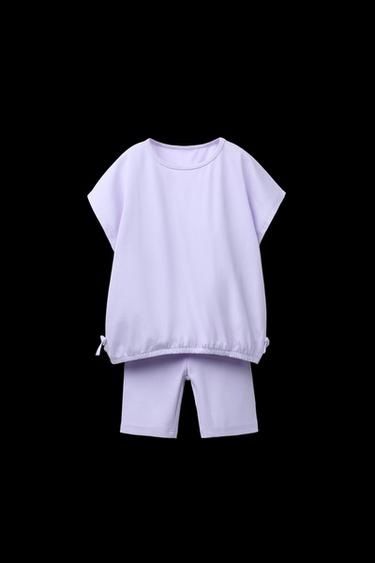 JOGGINGANZUG T-SHIRT MIT SCHLEIFEN UND GERIPPTE RADLER-LEGGINGS - Flieder von Zara