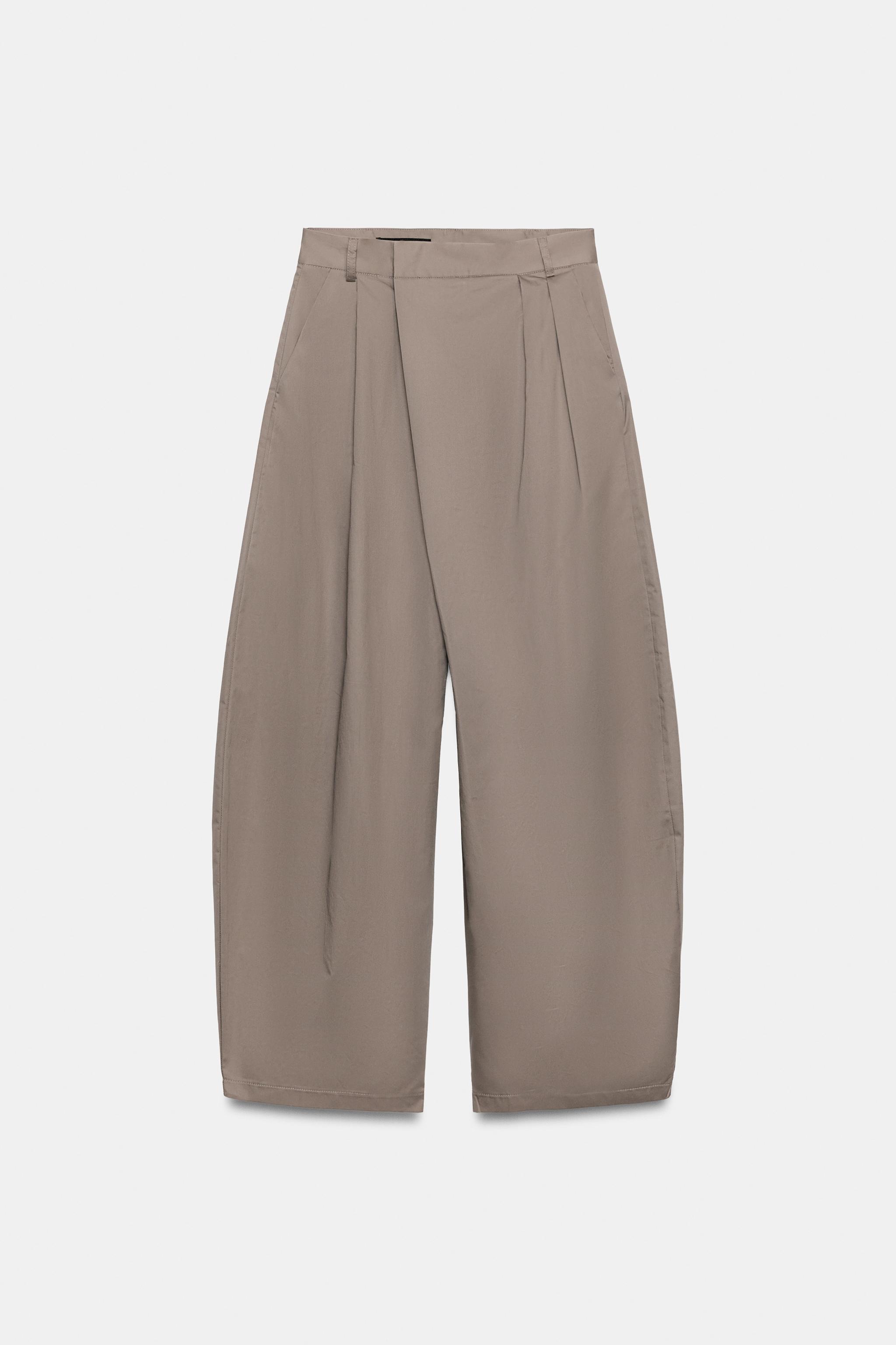 ASYMMETRIC WAIST PLEATED TROUSERS