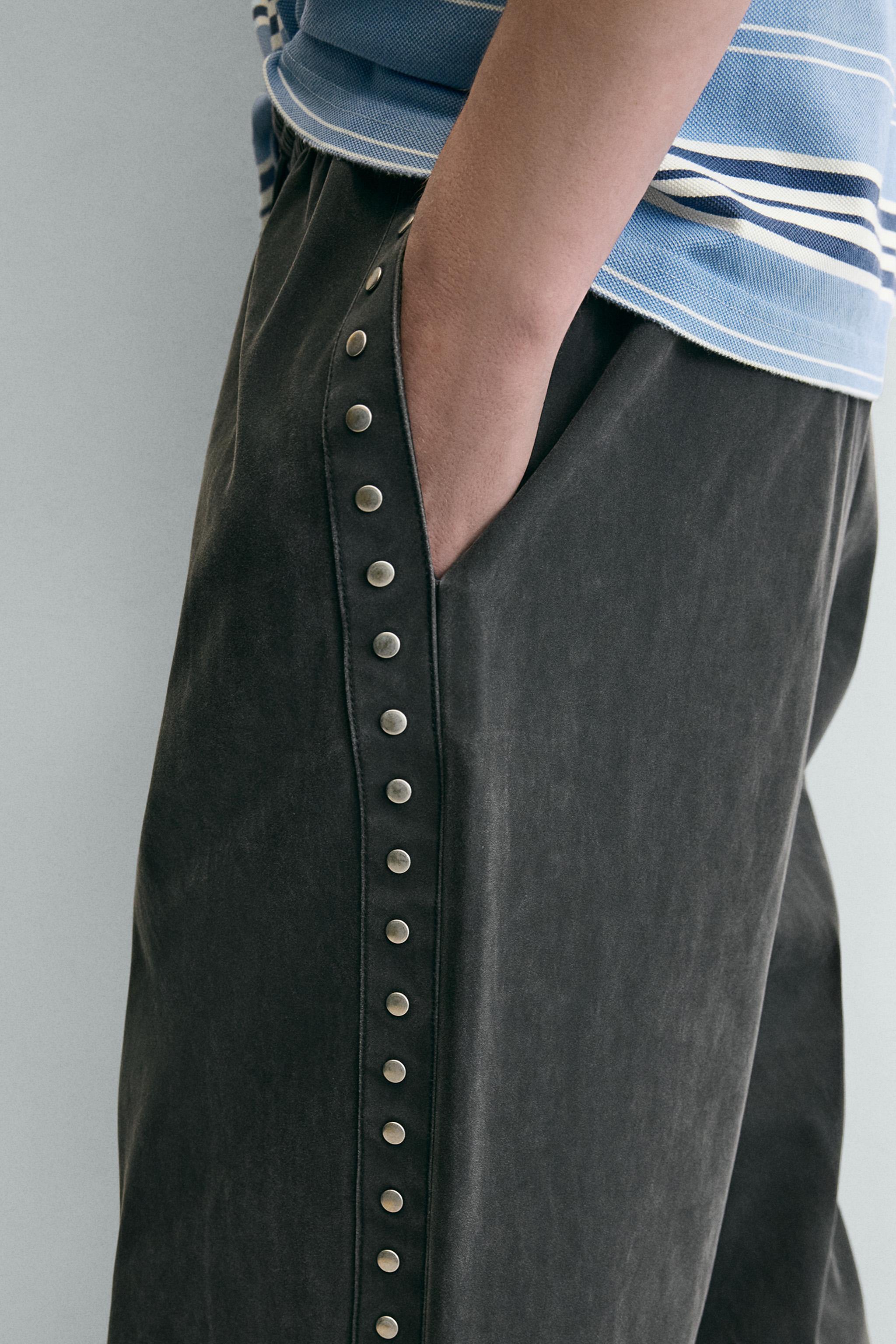STUDDED FAUX LEATHER RELAXED FIT PANTS
