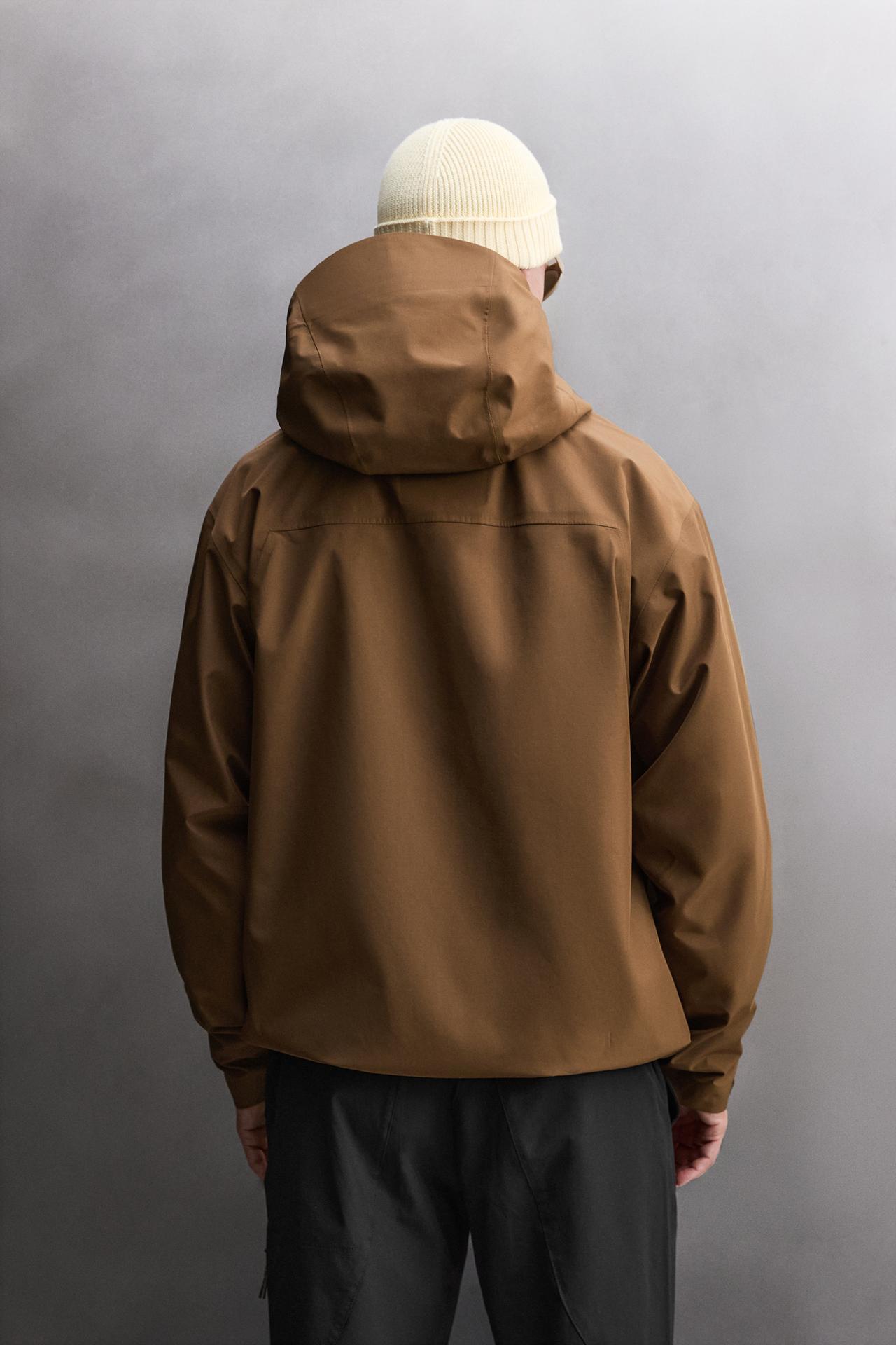 WATERPROOF TECHNICAL JACKET — Brown