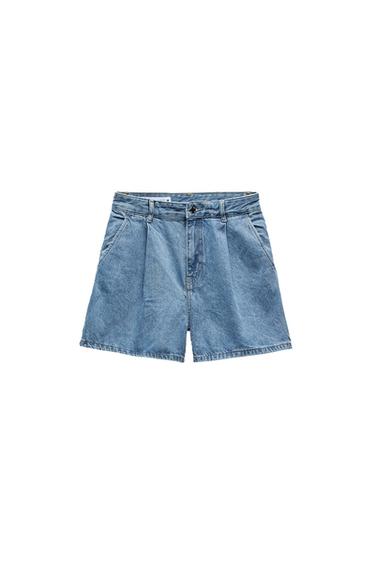 Front view of blue denim shorts with side pockets and button fastening.