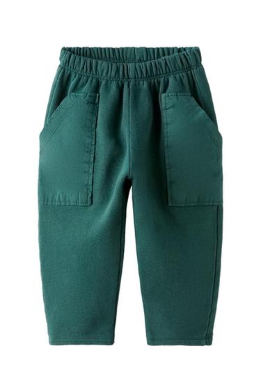PLUSH TROUSERS WITH MULTIPLE POCKETS