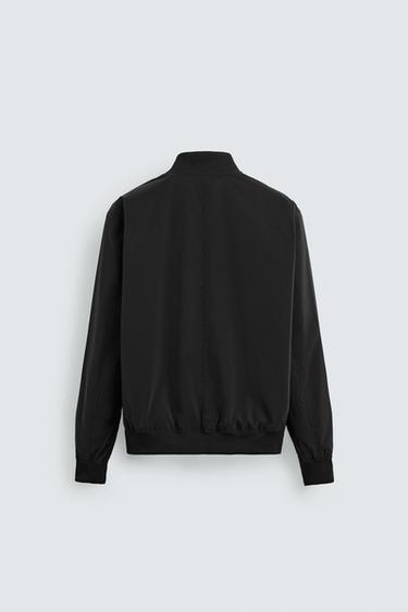 CAZADORA BOMBER LIGERA - Negro de Zara