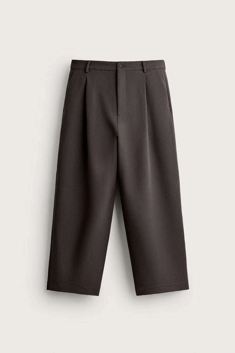 RELAXED FIT PLEATED TROUSERS