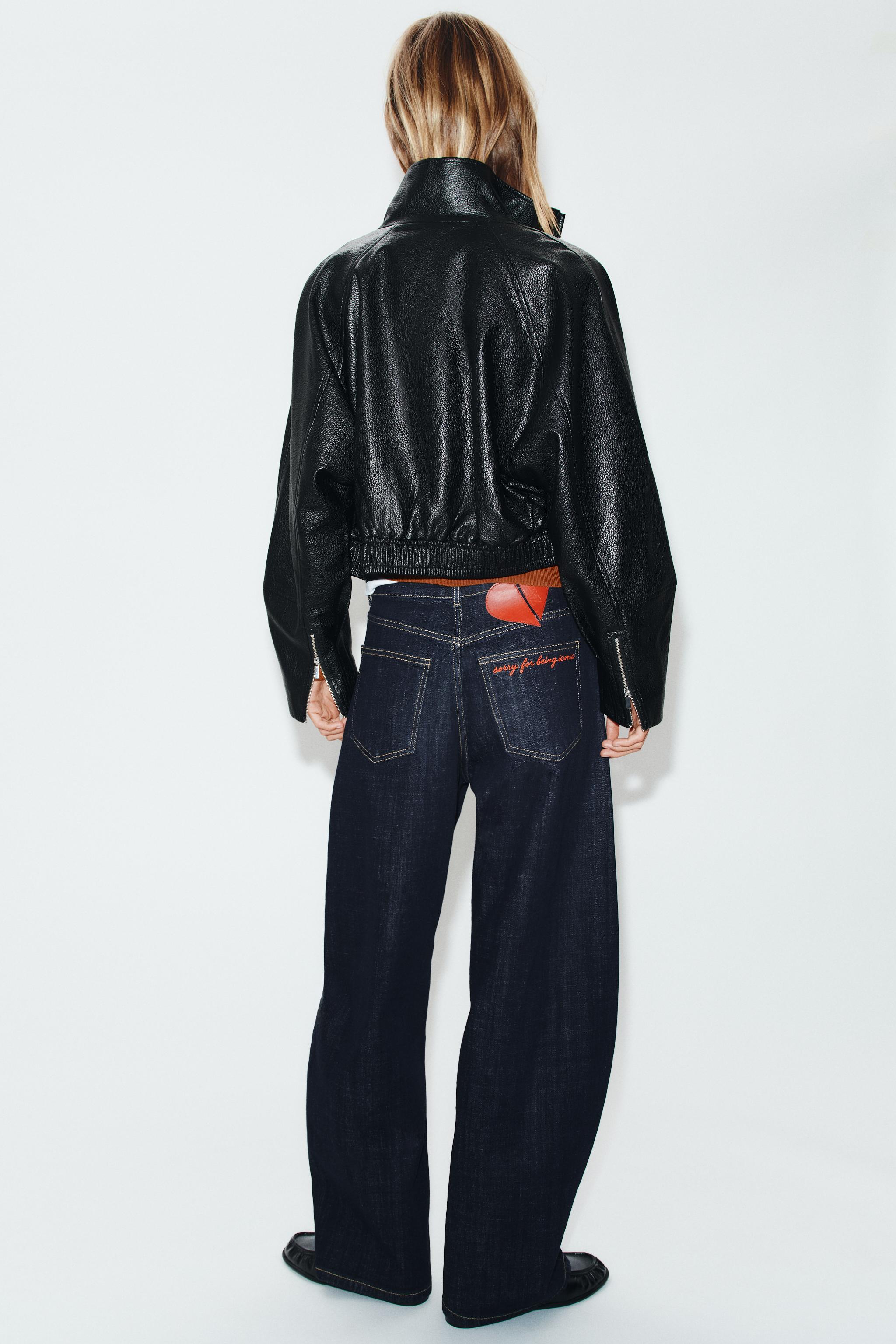 BLOUSON COURT EN MATIÈRE SYNTHÉTIQUE