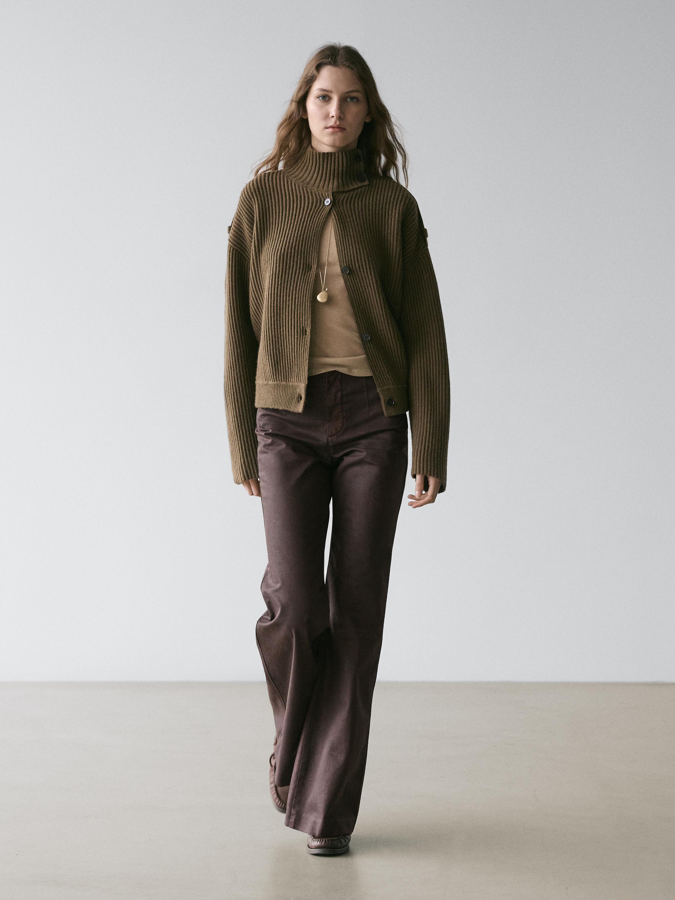 Waxed flare fit trousers