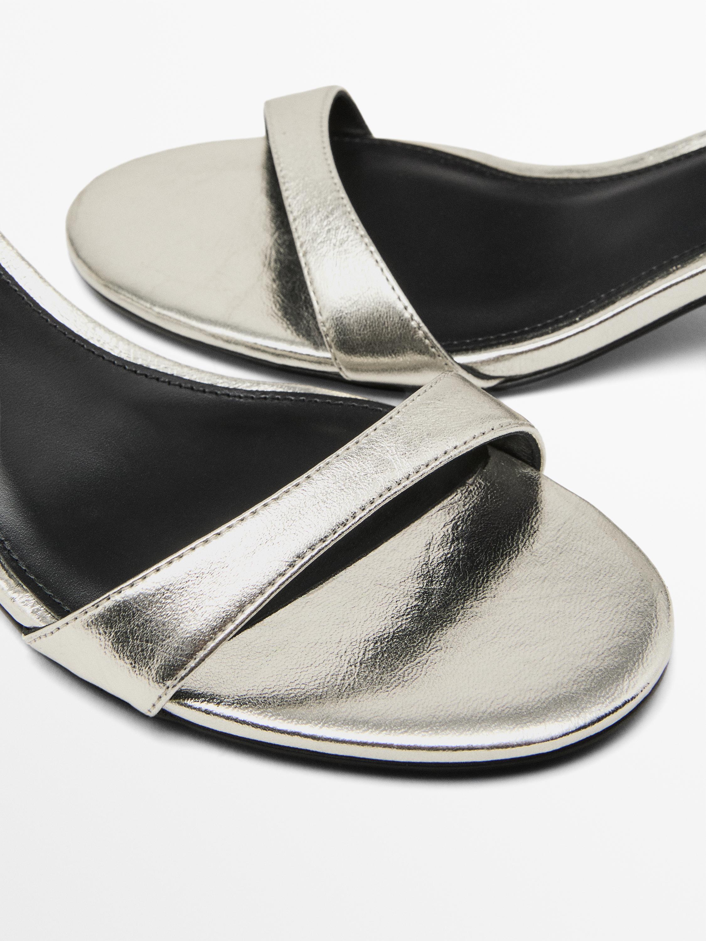 High-heel sandals with metallic strap