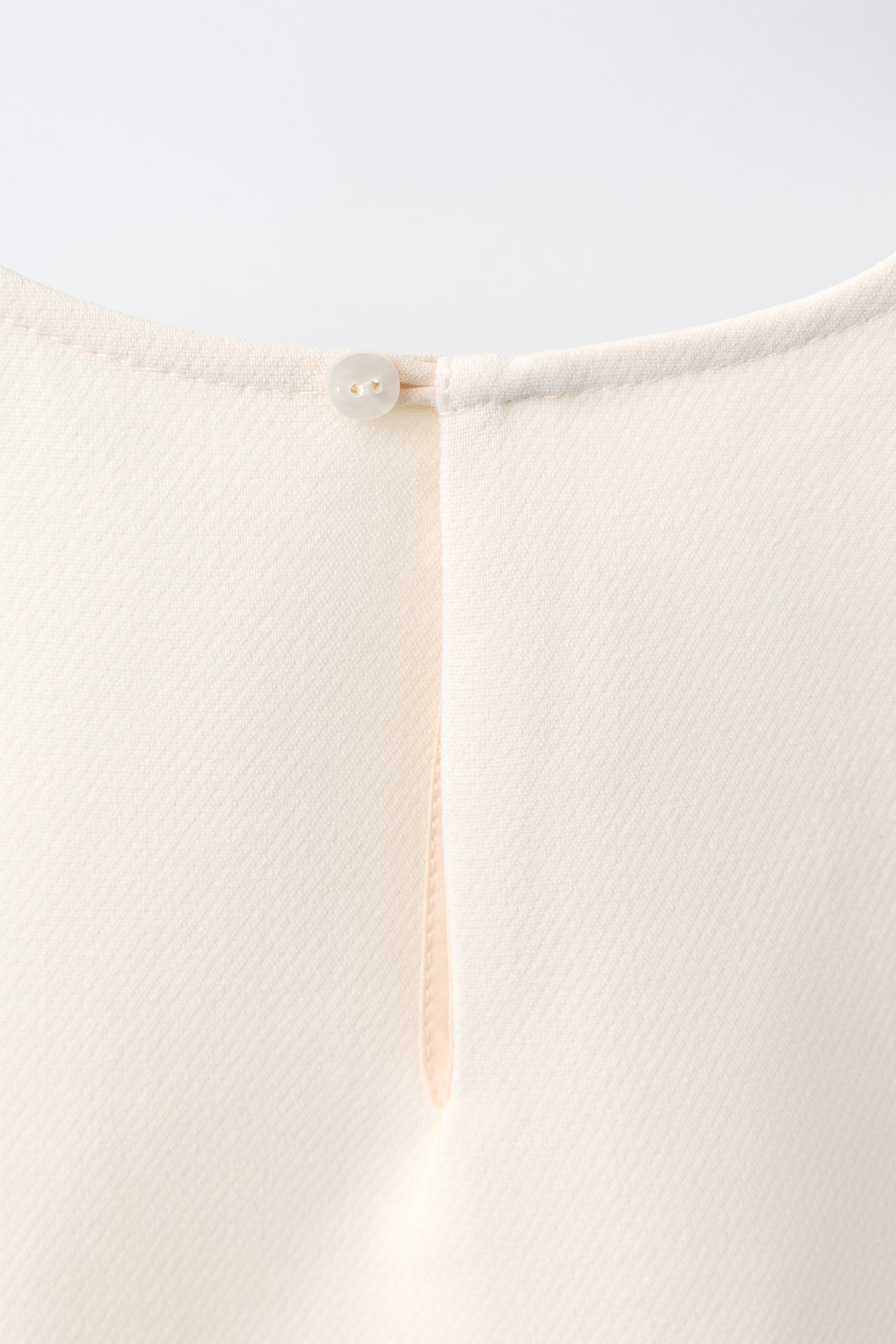 BOW APPLIQUÉ TOP